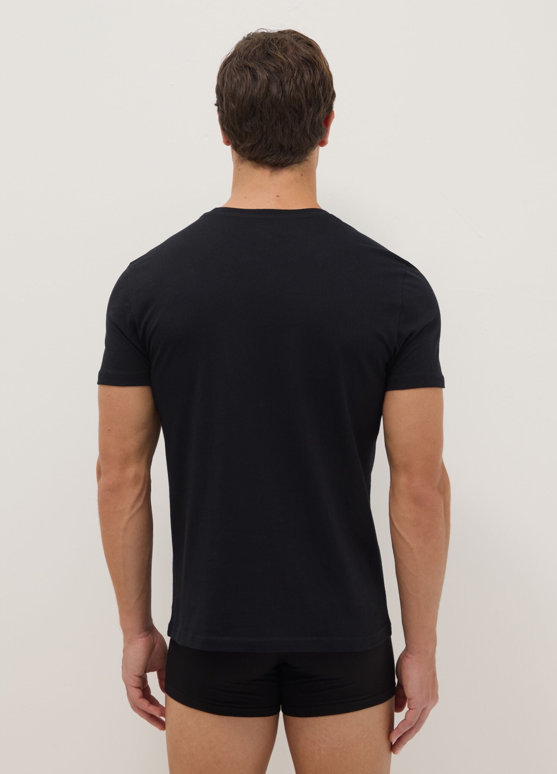 Pack of three black crew-neck cotton t-shirts in regular fit