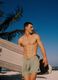 Green swim shorts with elasticated waistband and drawstring_0