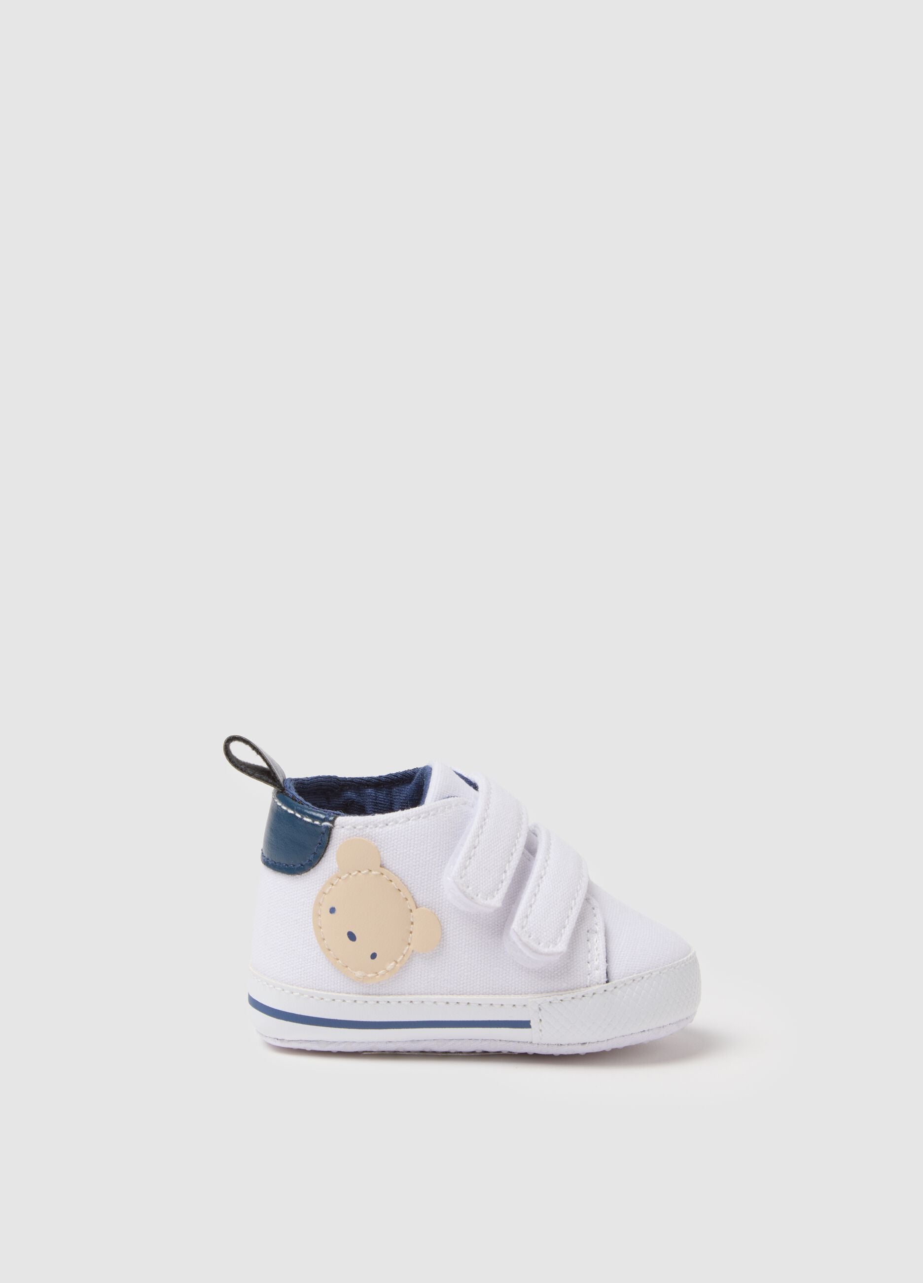 White canvas baby shoes