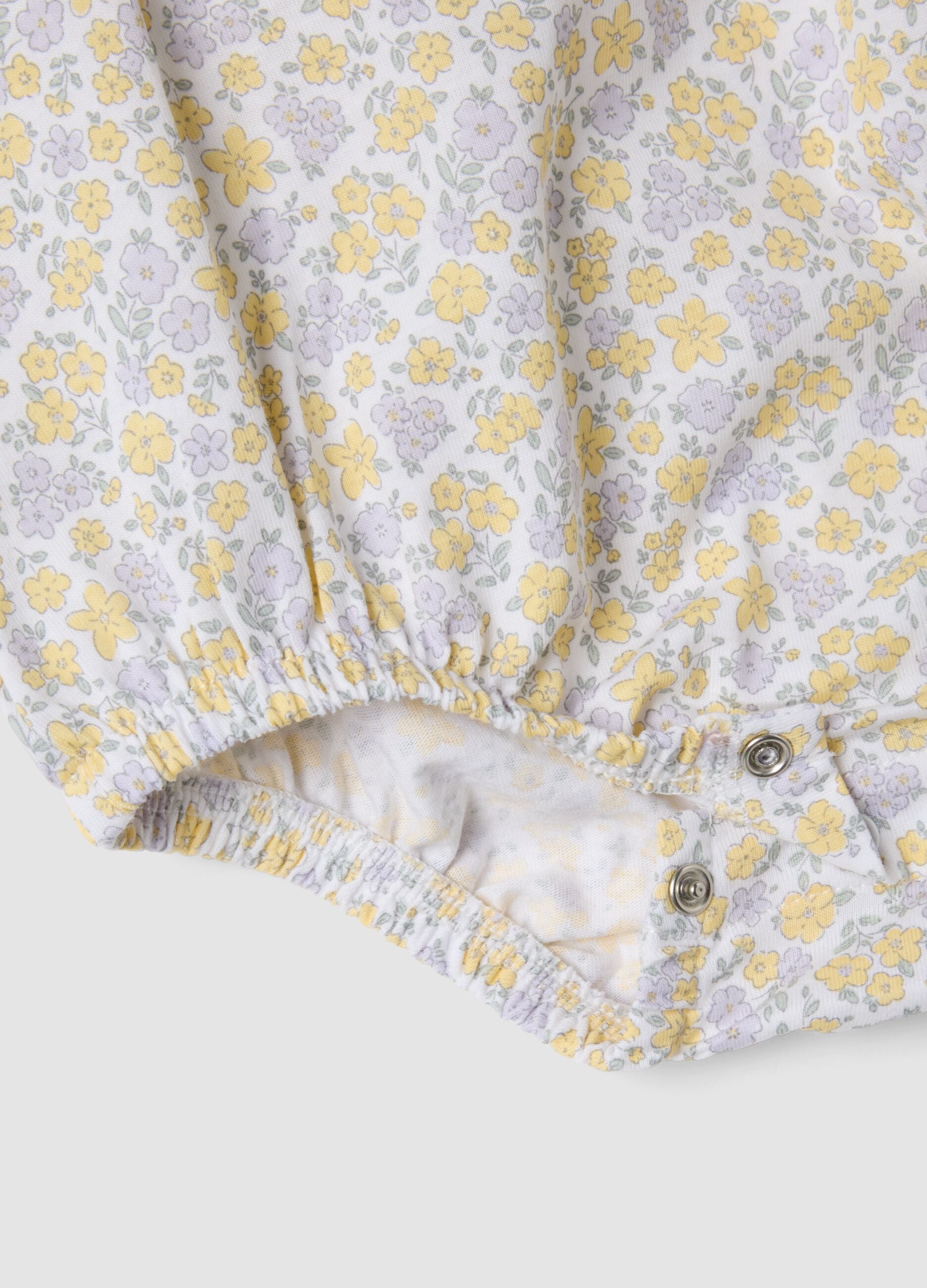 White pure organic cotton bodysuit with collar and floral print