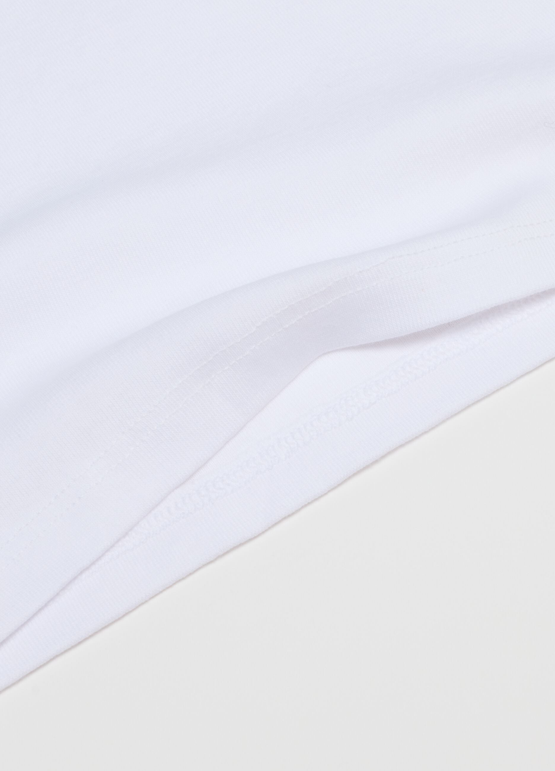 Baby's white cotton tank top tripack