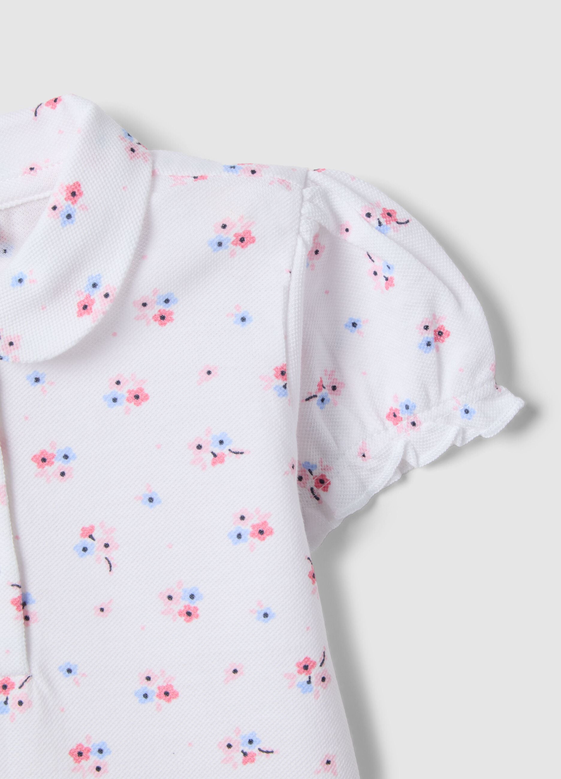 Girls' pure cotton white polo with floral pattern, regular fit