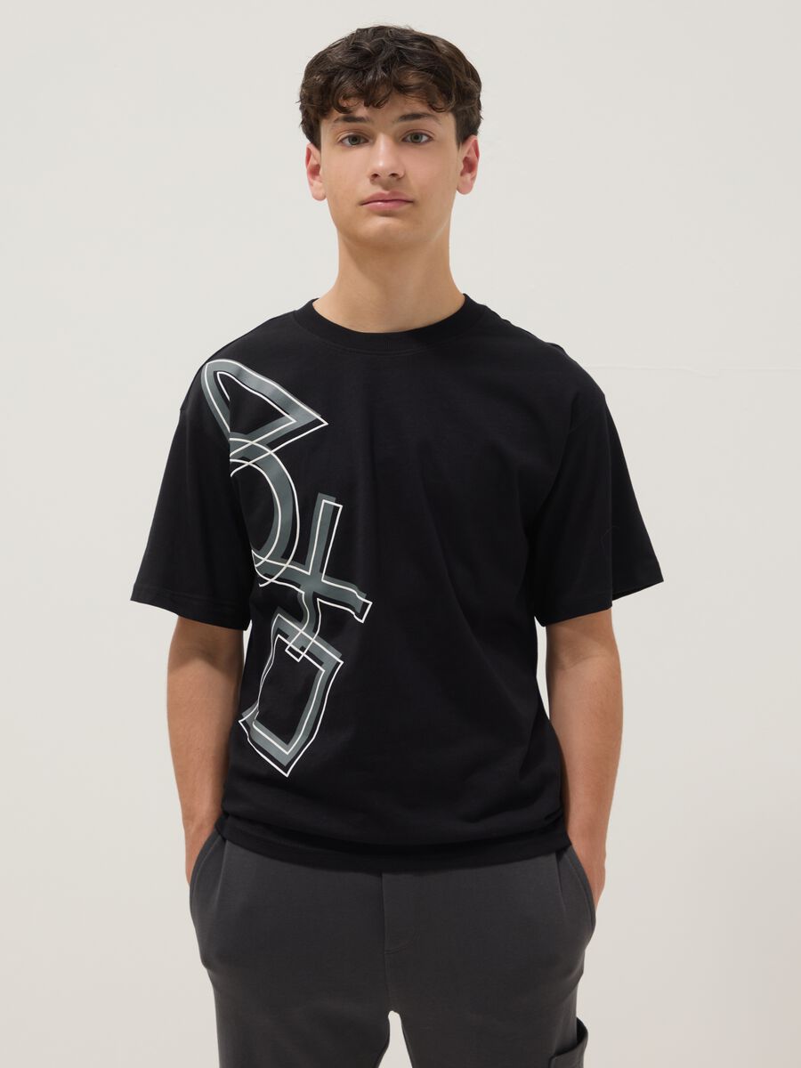 T-shirt nera da ragazzo con logo Playstation in puro cotone relaxed fit_0