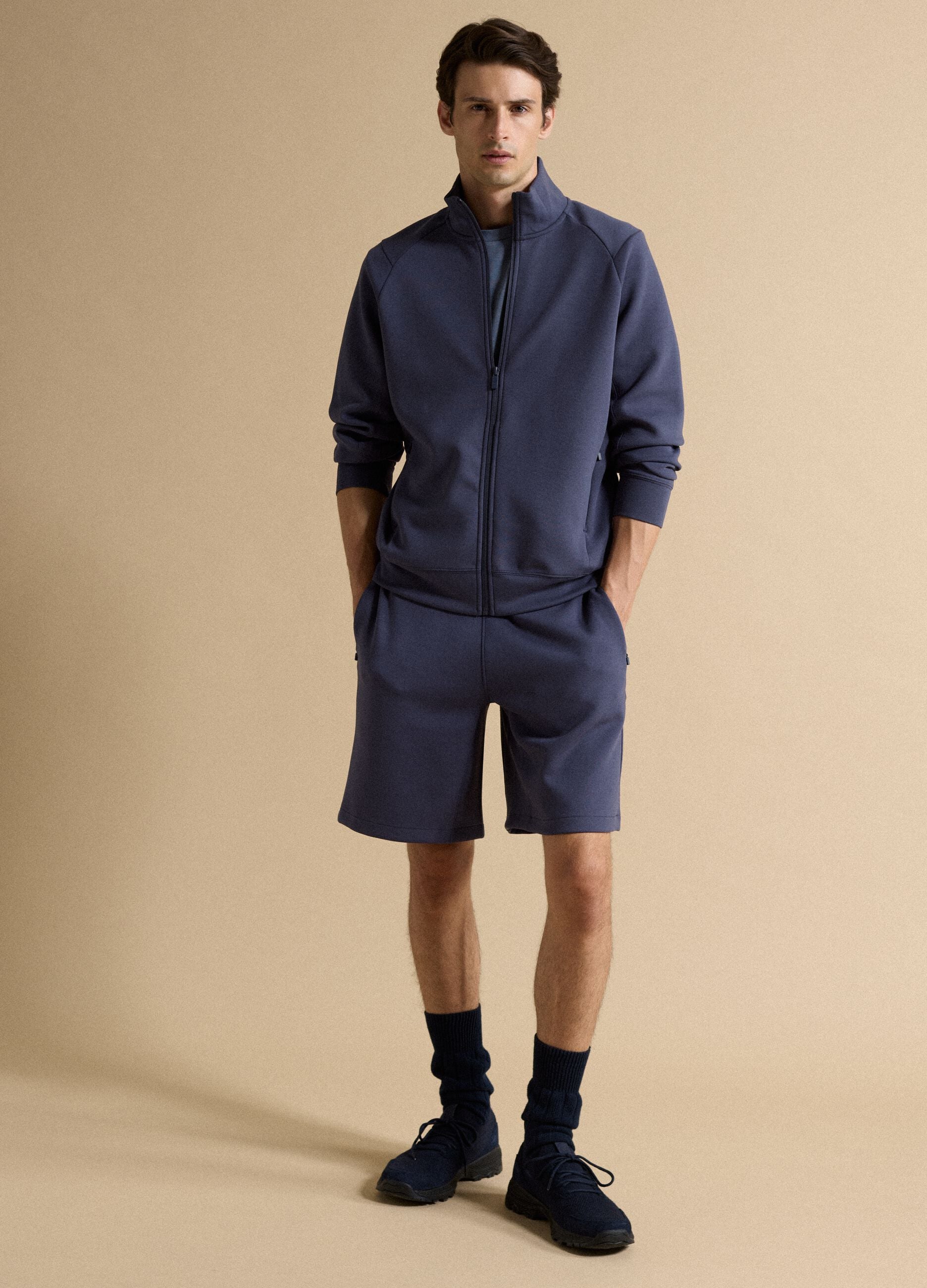 Blue full-zip jacket with stretch Easy Dry fabric collar, regular fit