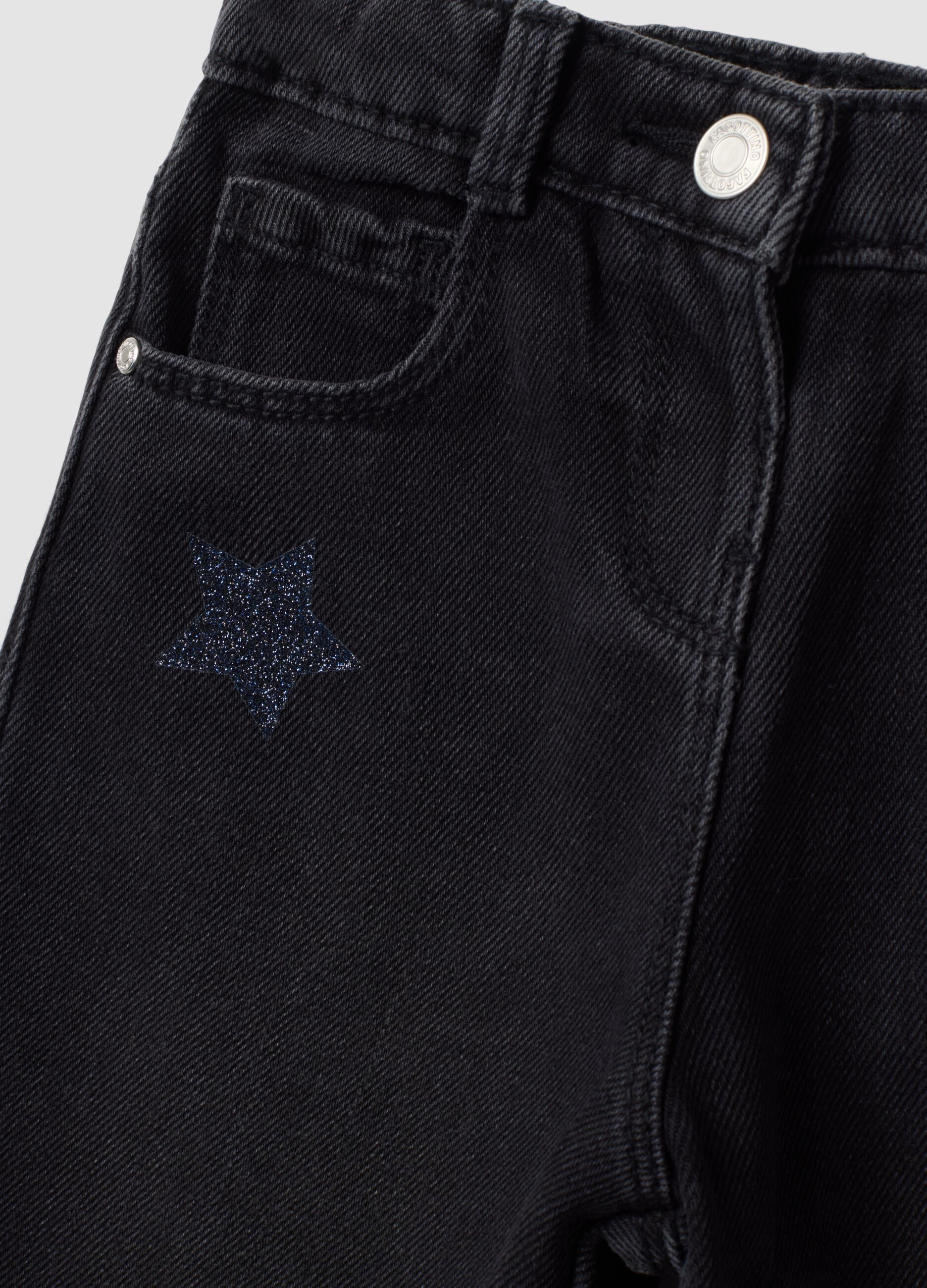 Black balloon-fit jeans in cotton and viscose blend with star print for baby girl