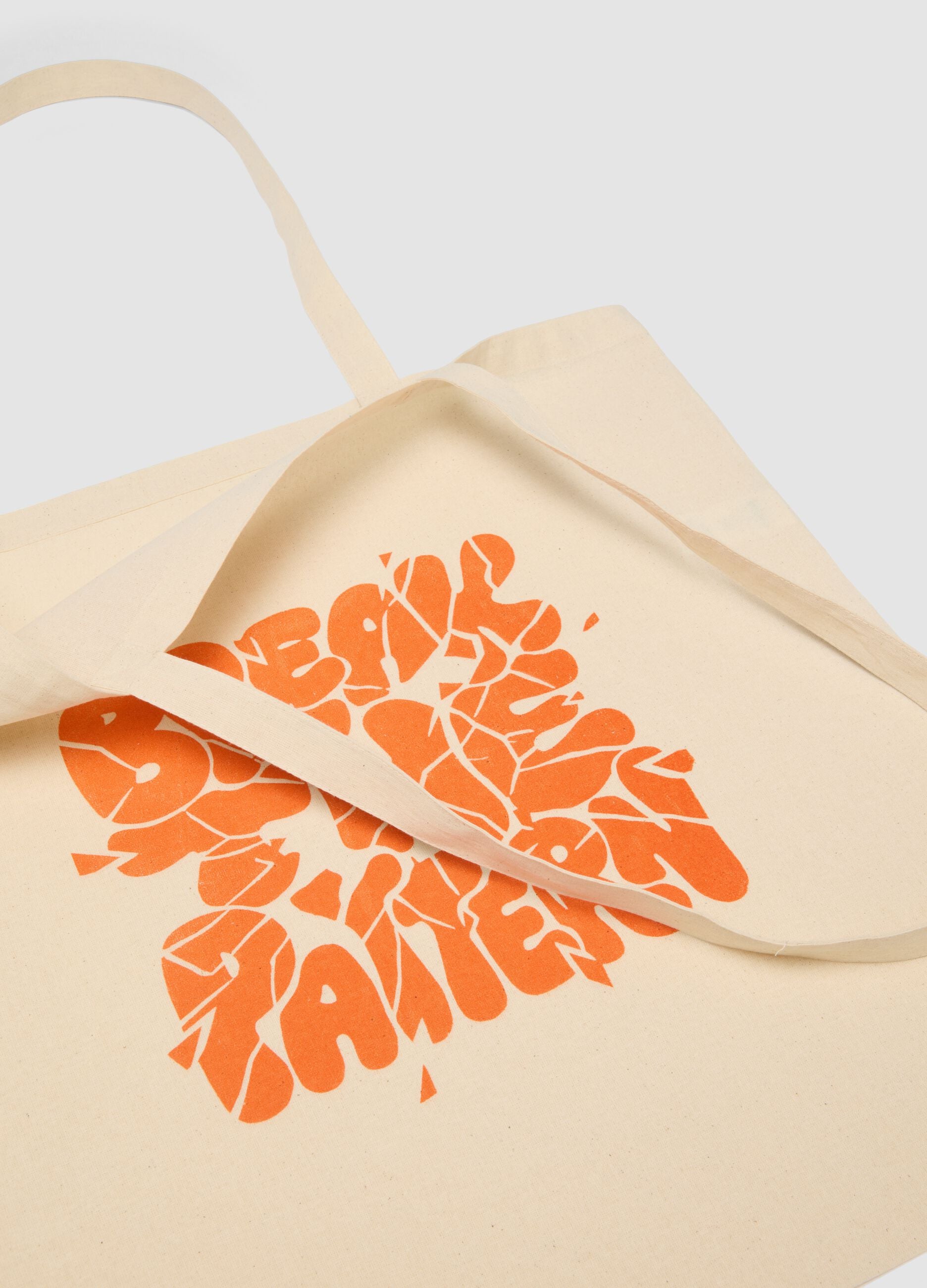 RE-UP tote bag with "Break the Pattern" screen print