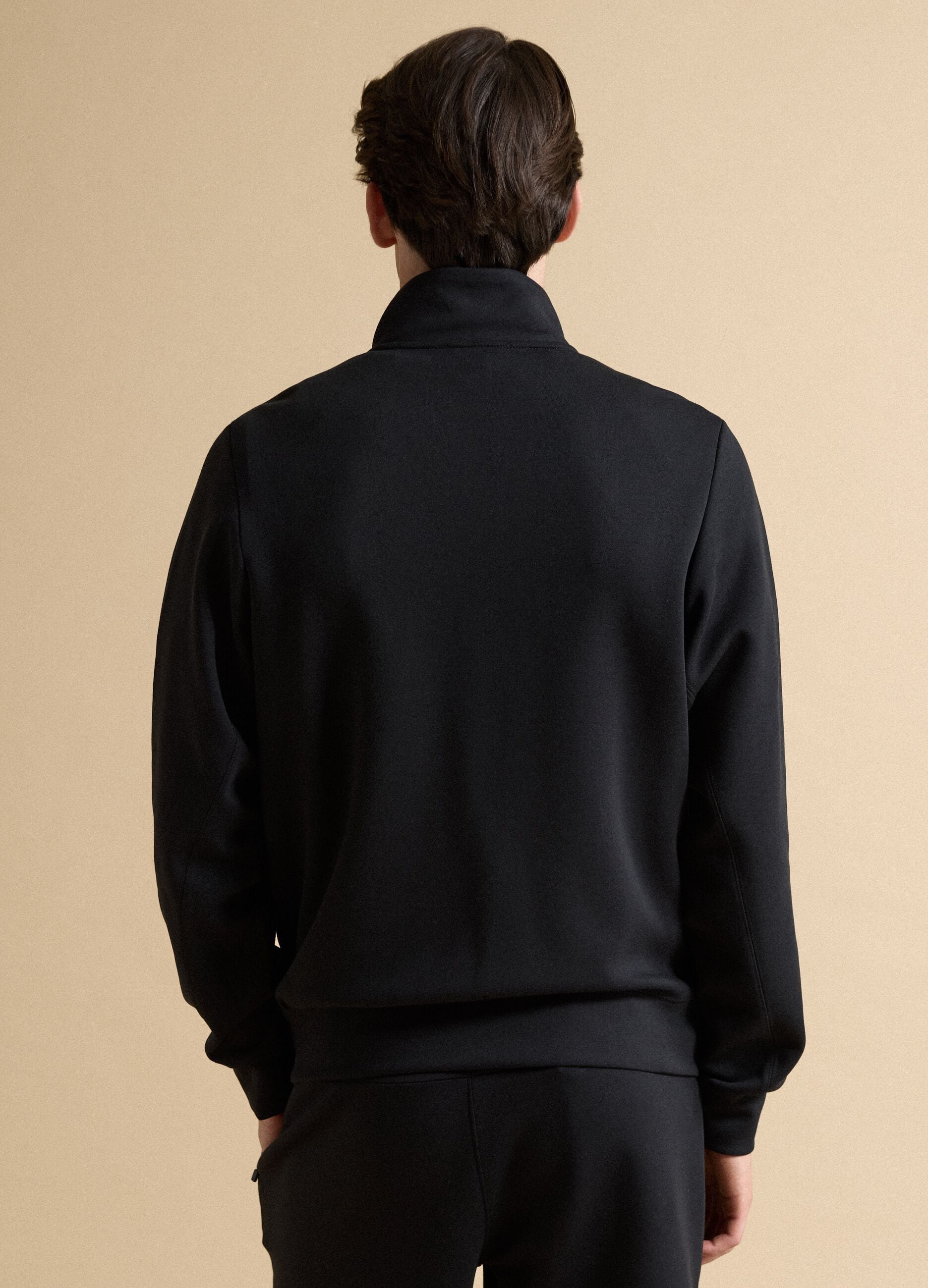 Black full-zip jacket with stretch Easy Dry collar, regular fit