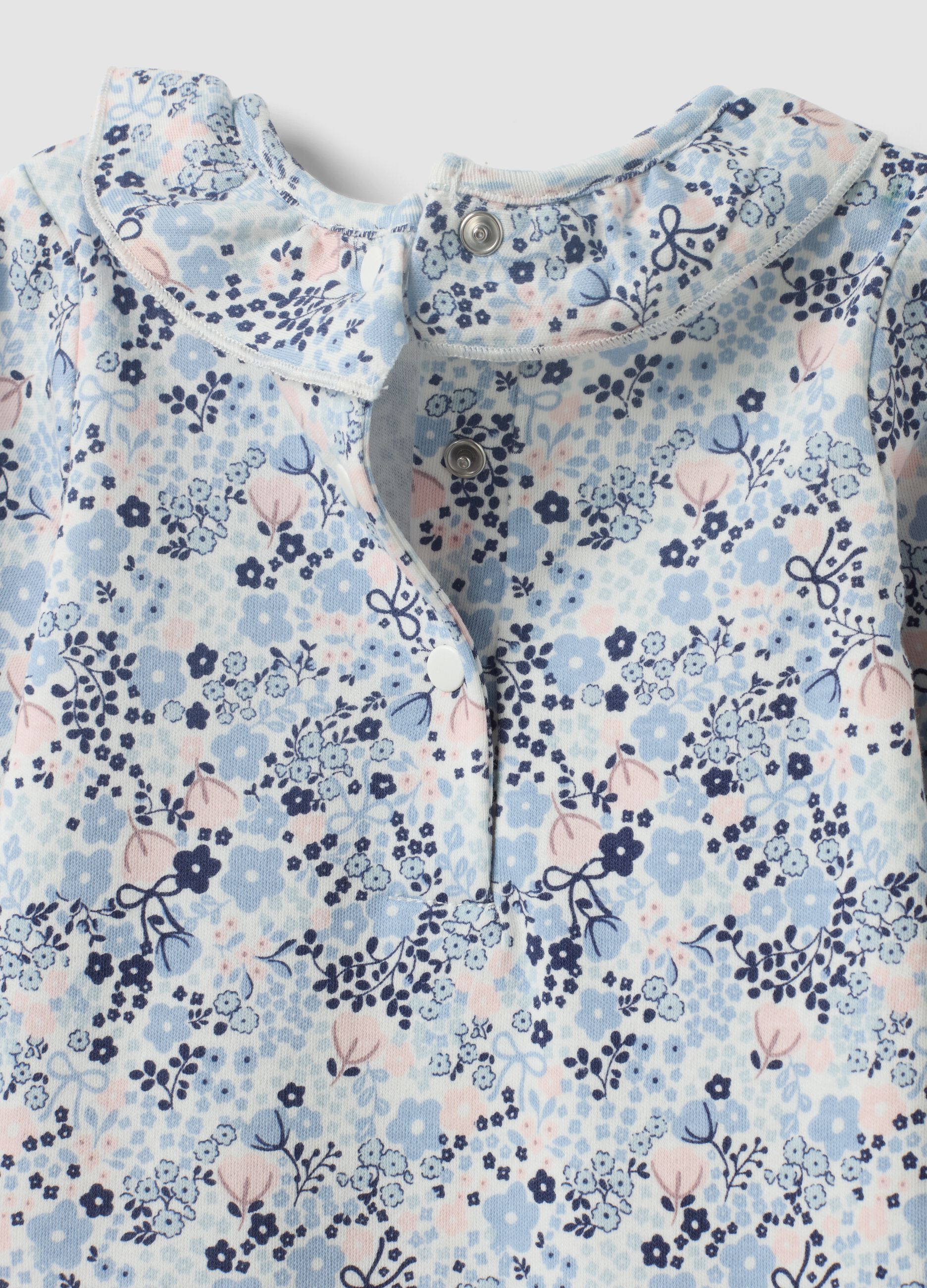 White organic cotton baby girl bodysuit with frill collar and floral print