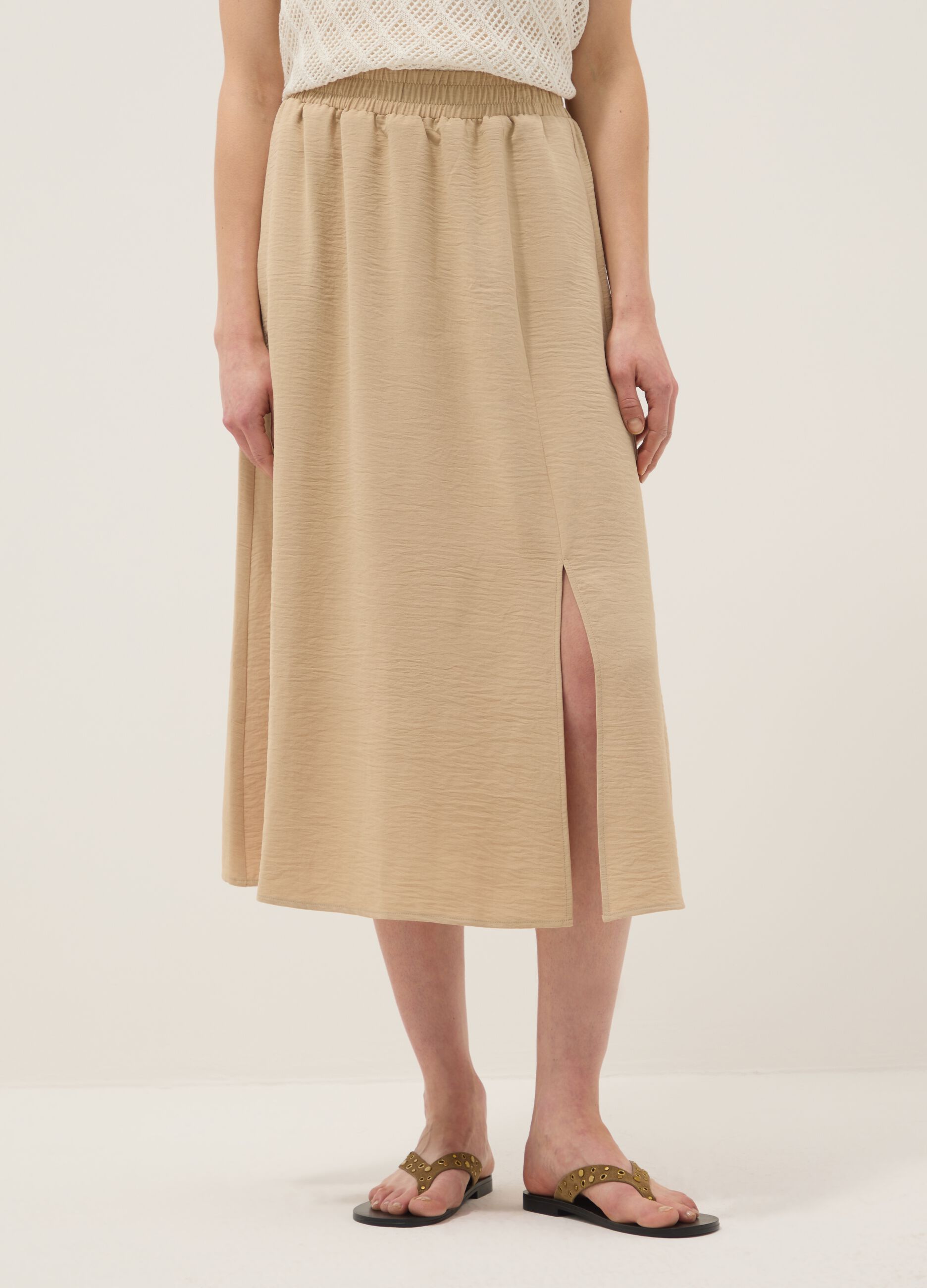 Beige long skirt, regular fit with elasticated waist and slit