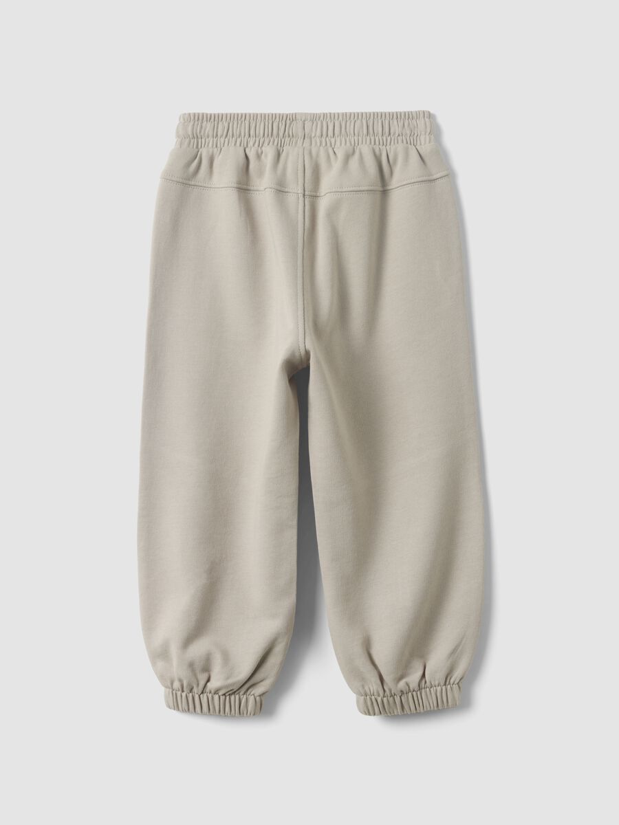 Grey jogger trousers in pure organic cotton for baby boy_1