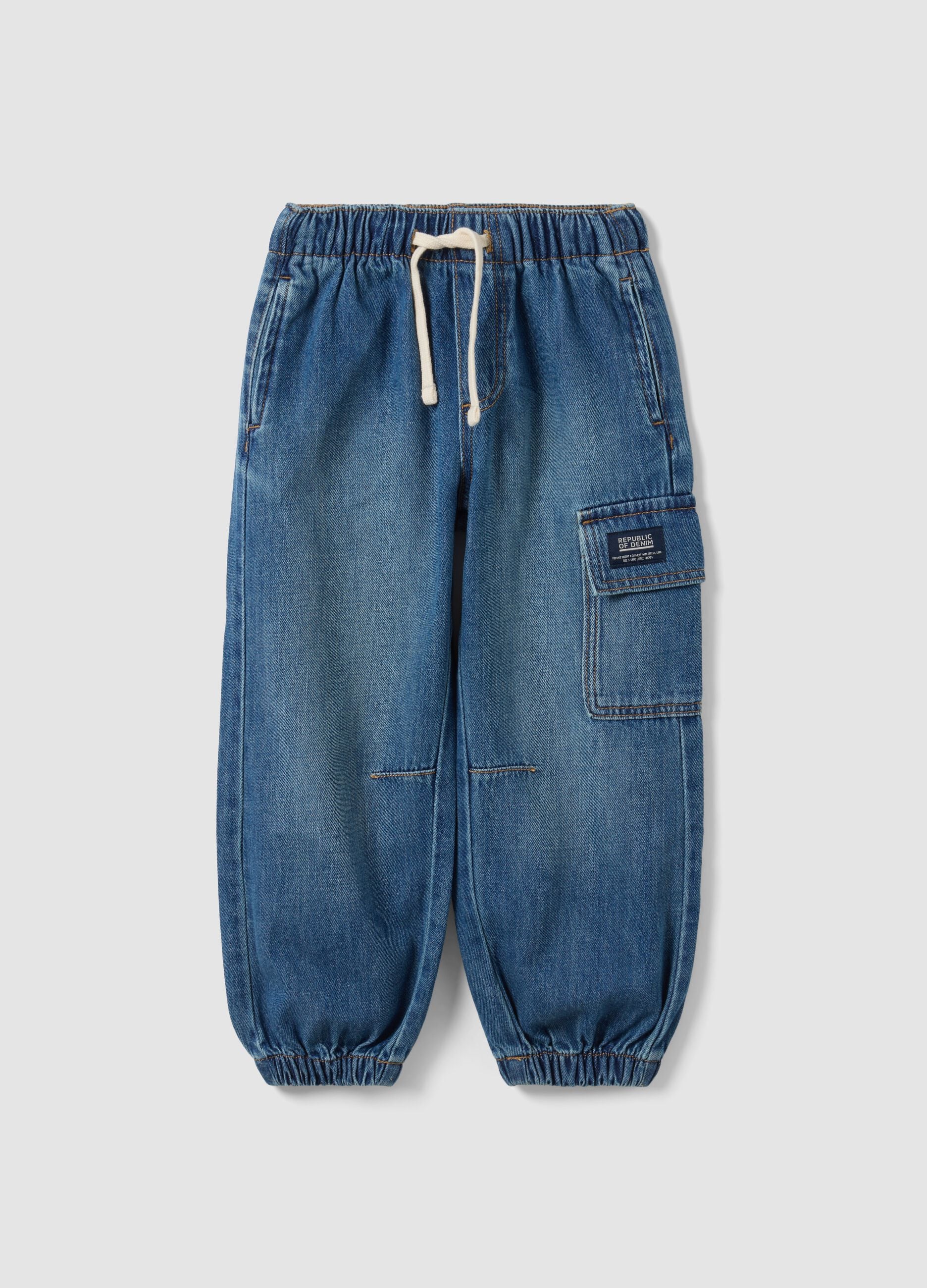 Light blue denim joggers in cotton-viscose blend with cargo pockets, relaxed fit