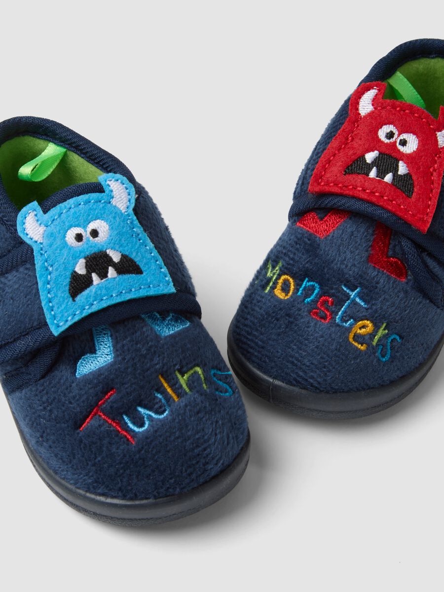 Blue slippers with embroidered monsters_1
