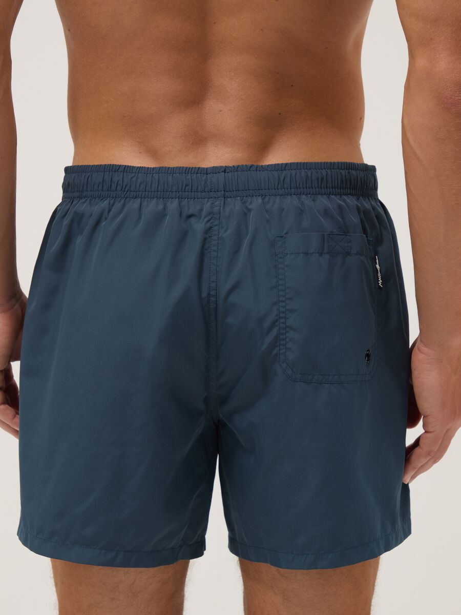 Blue swim shorts with elasticated waistband and drawstring_2