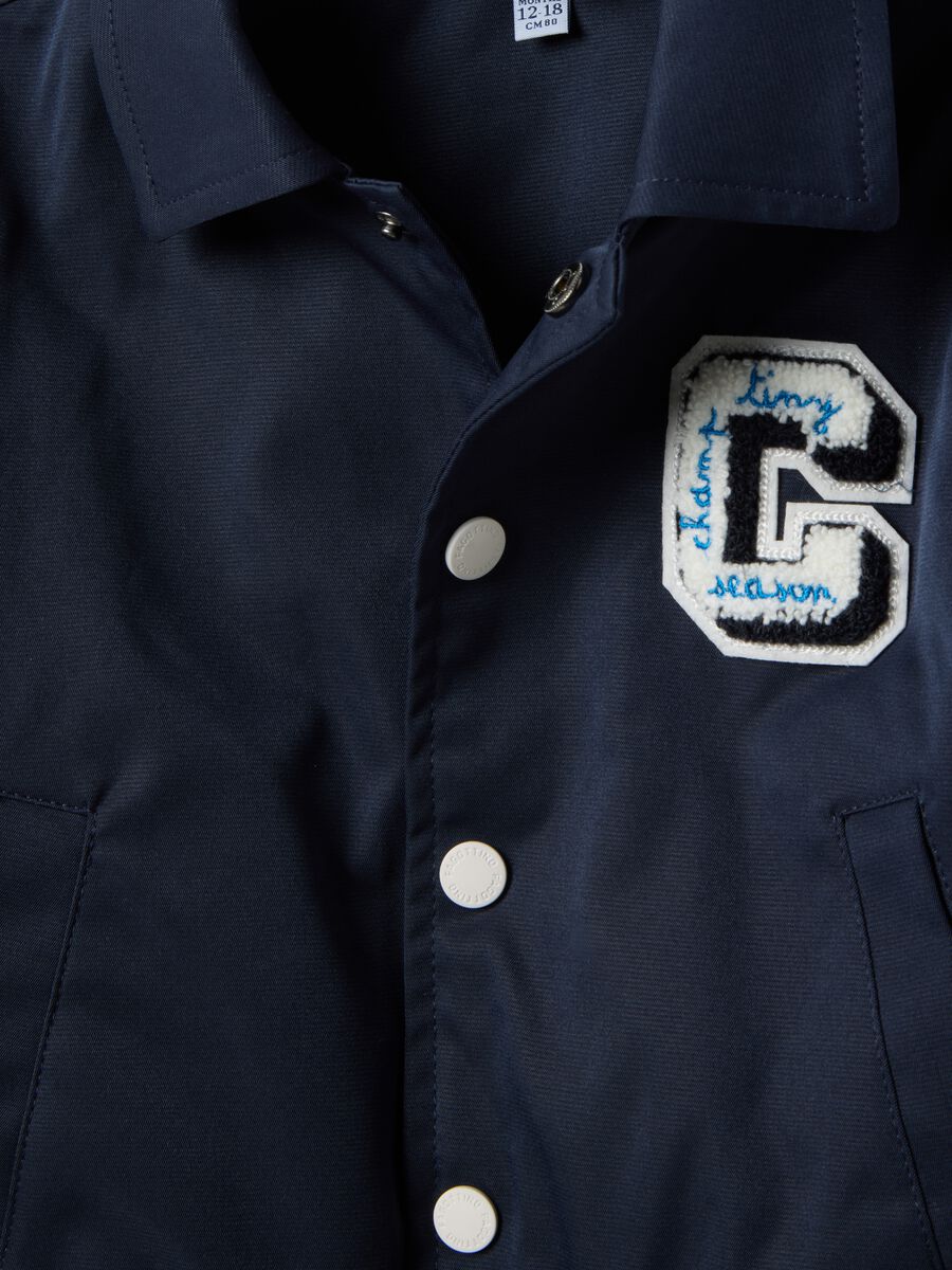 Giacca blu regular fit con polsini a righe per bimbo_2