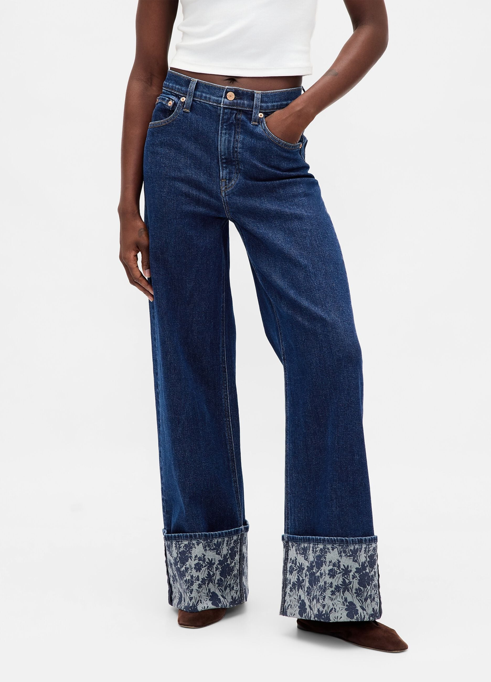 Wide denim trousers with floral turn-up