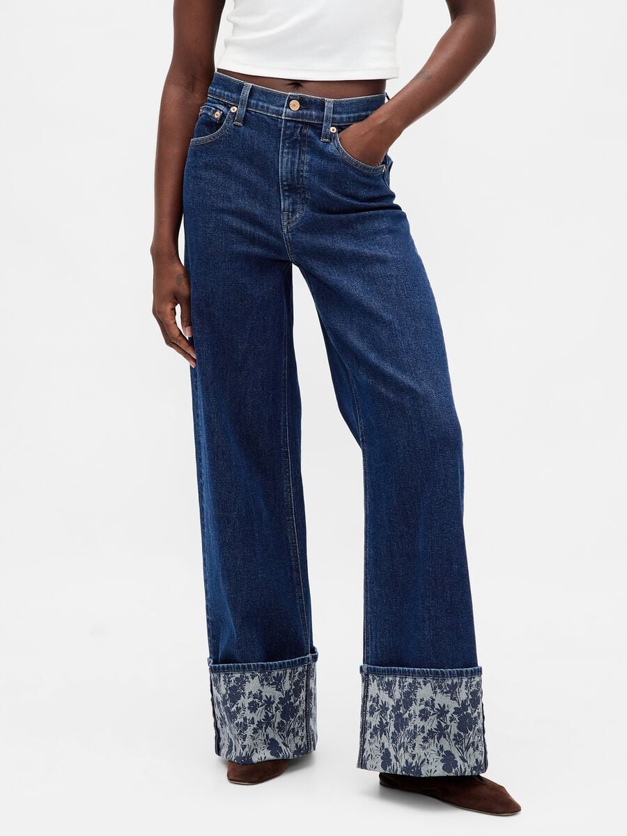 Wide denim trousers with floral turn-up_1