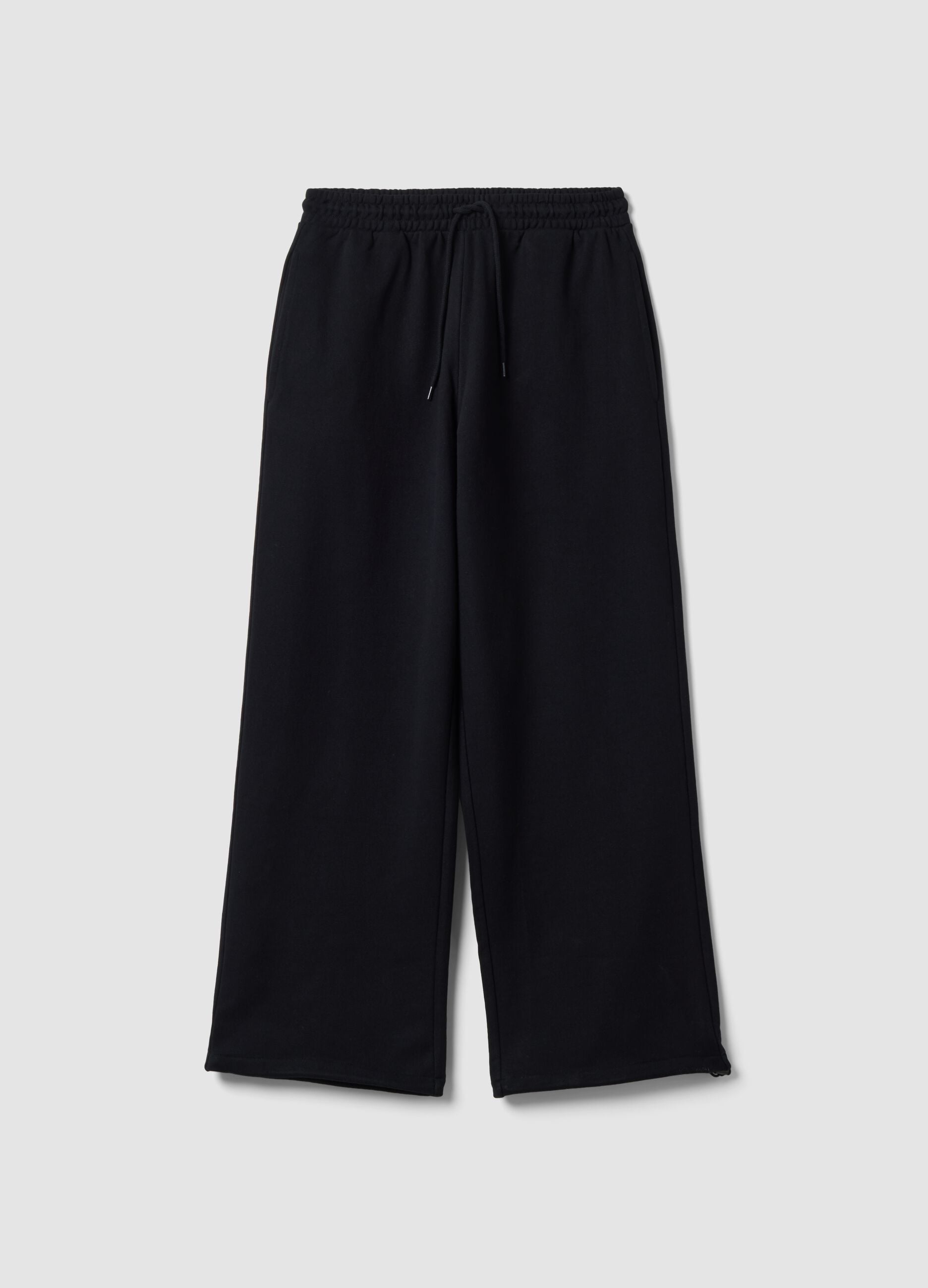 Black pure cotton joggers with elasticated waistband, oversized fit
