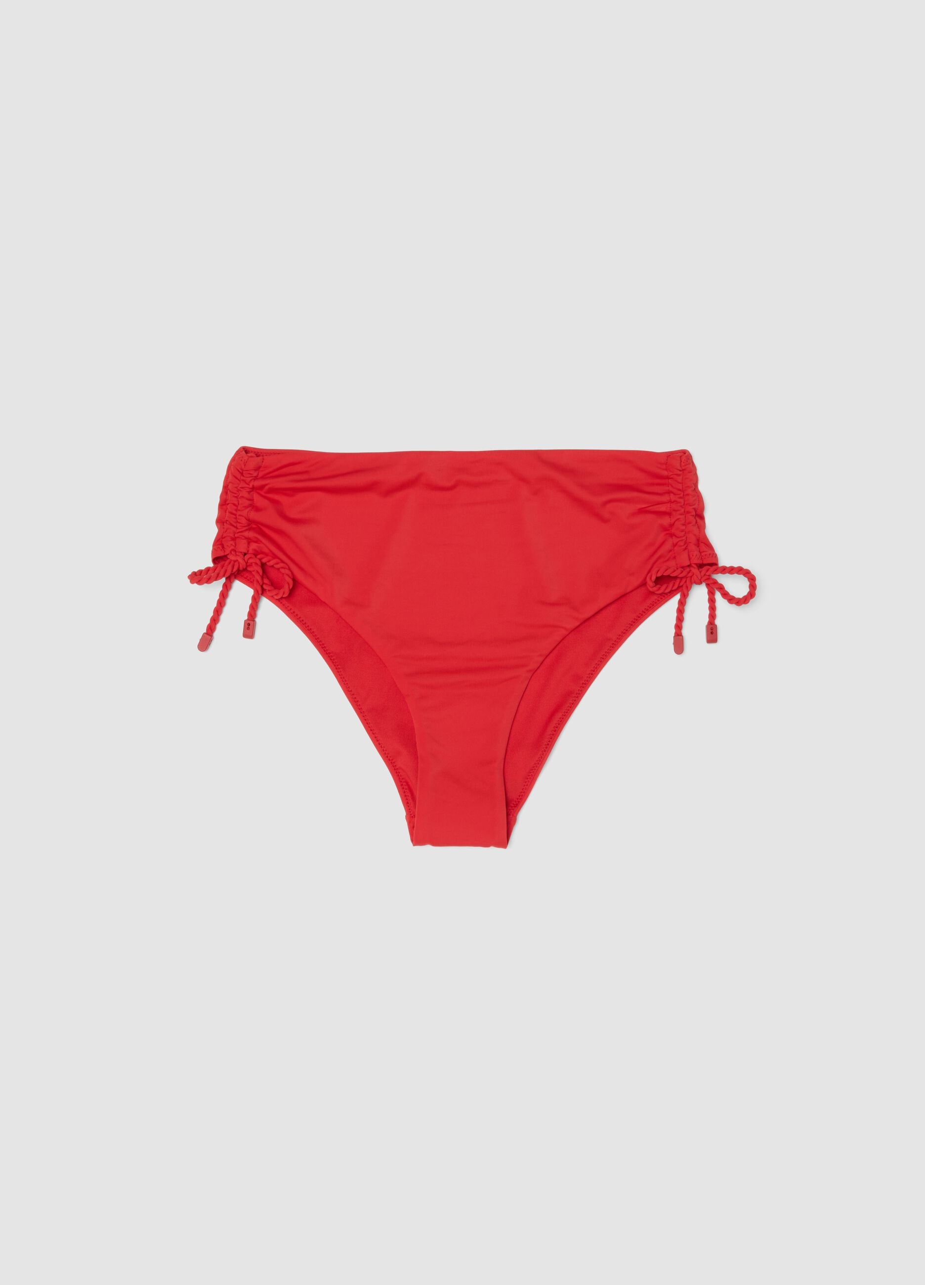 Red bikini bottoms in stretch fabric with side ties