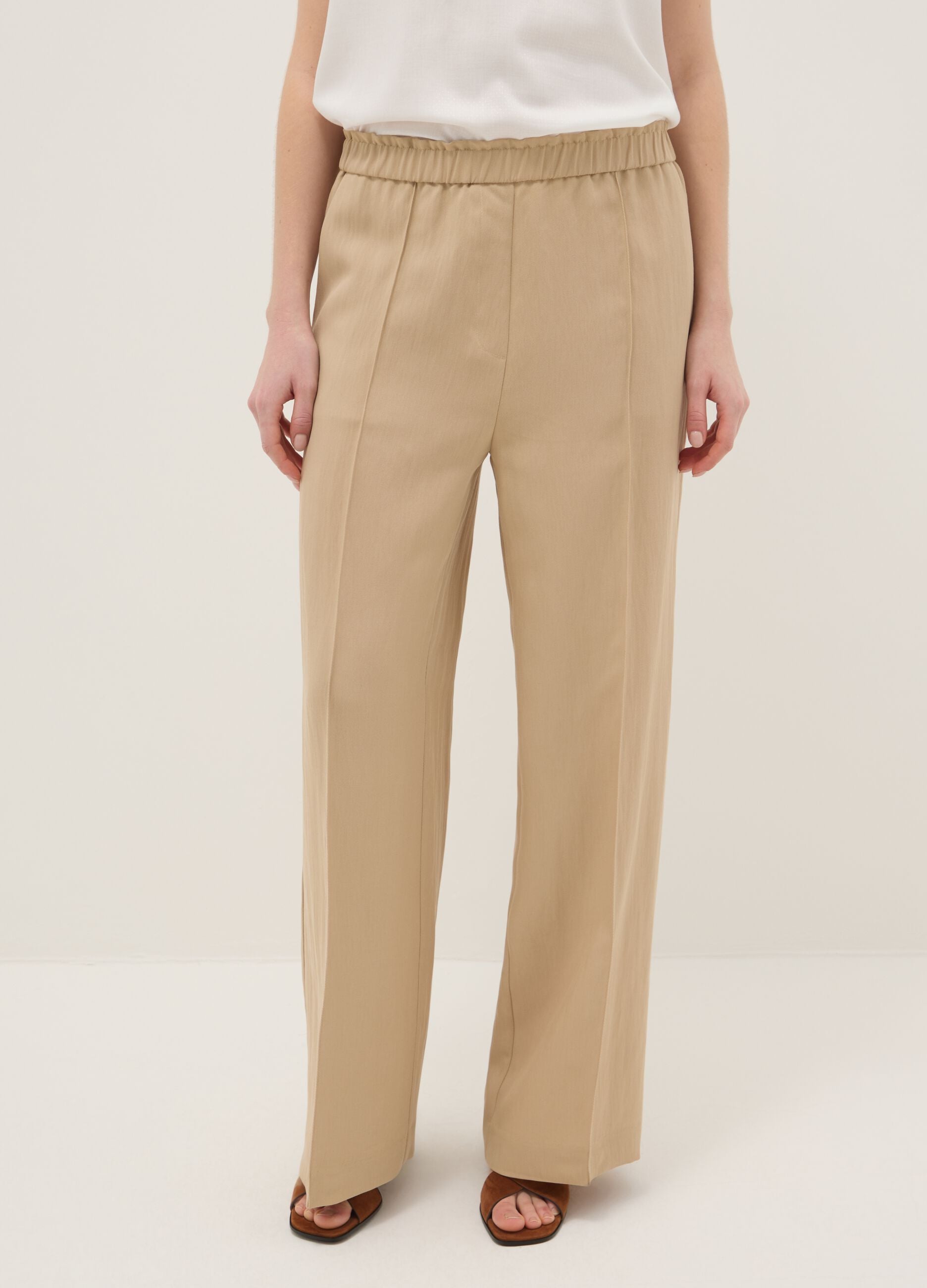 Beige wide leg jogger trousers in Lyocell and viscose blend