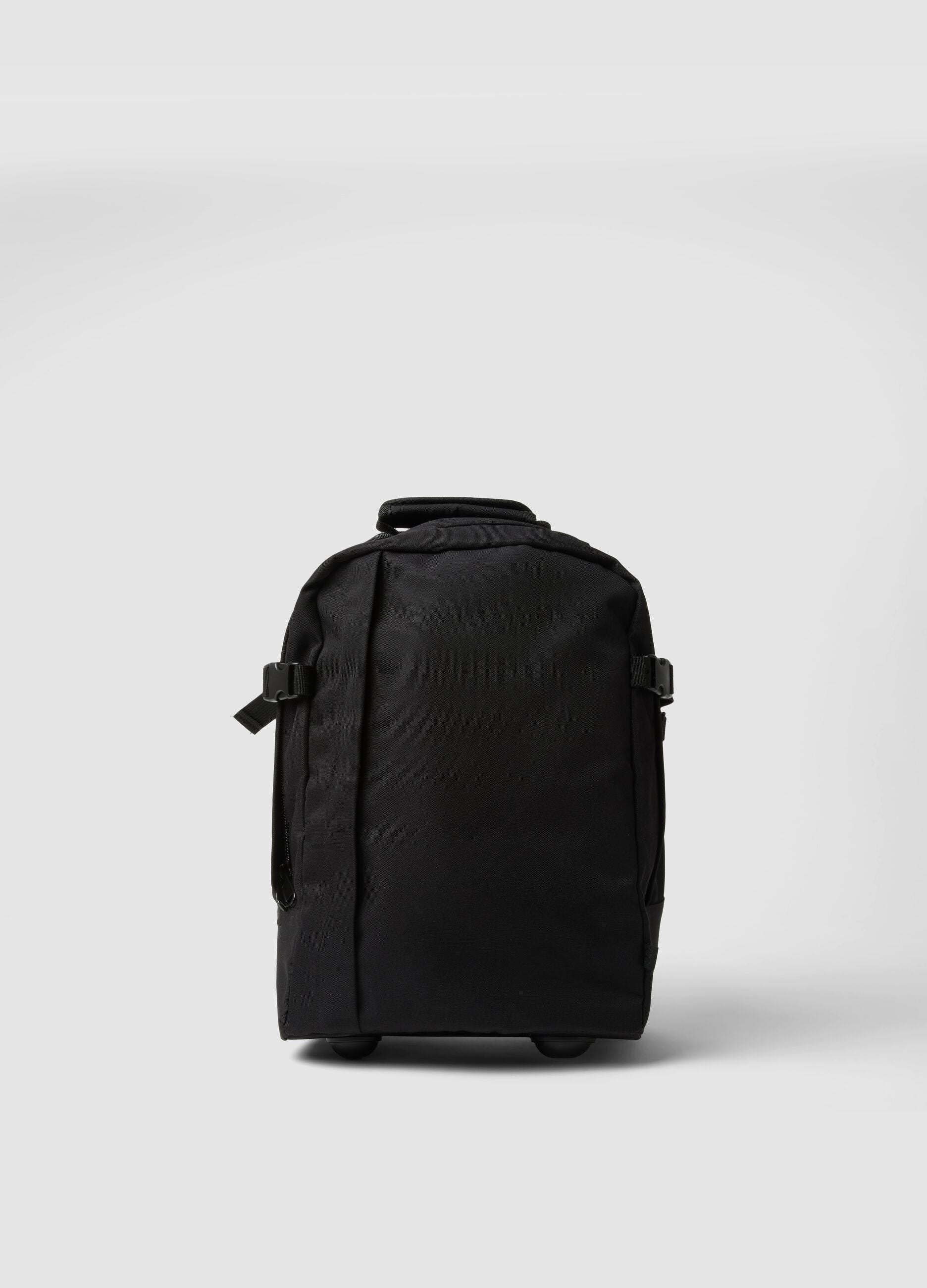 Black trolley bag with shoulder straps and telescopic handle