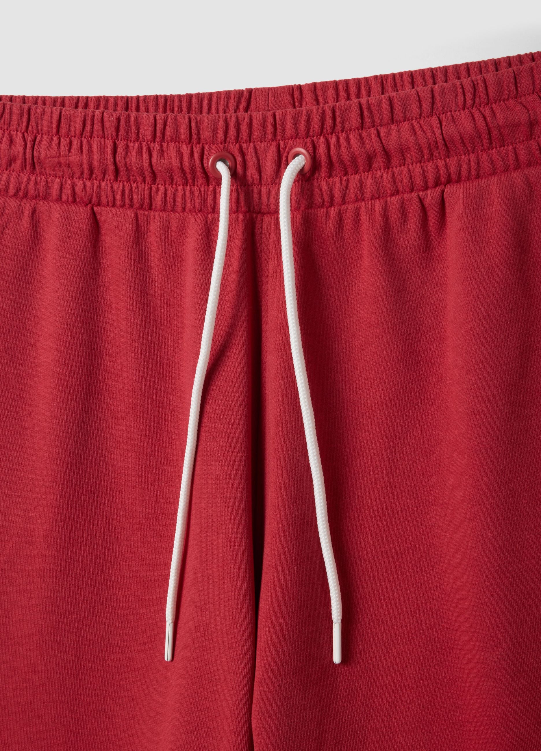 Red cotton-blend sports shorts with Miami Heat logo