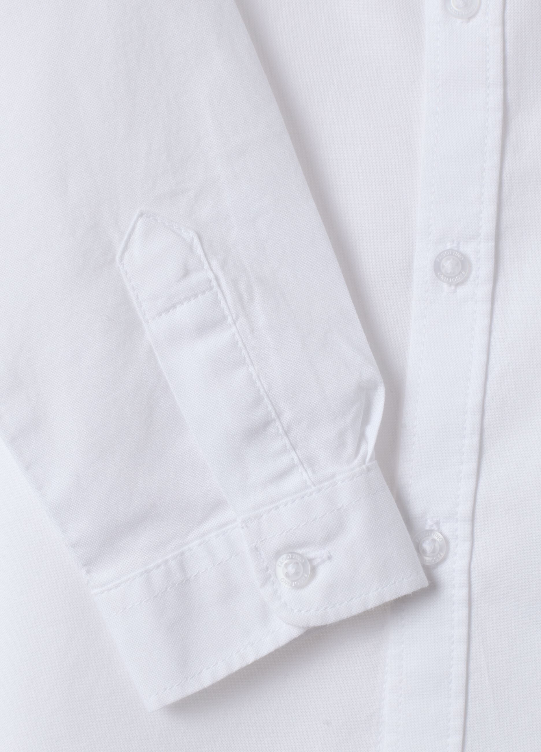 White pure cotton shirt with classic collar and chest pocket for baby boy