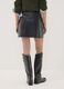 Short black A-line skirt with decorative flap pockets_3