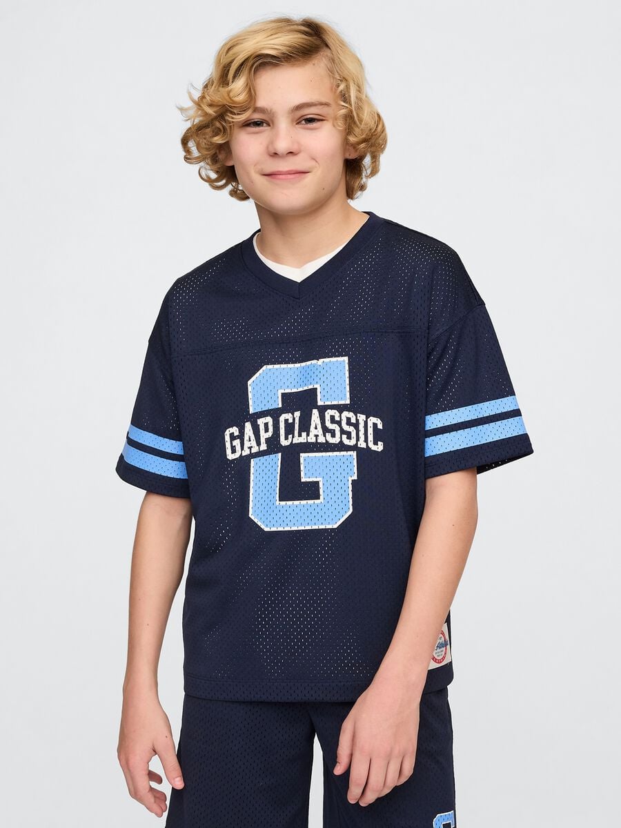 Blue sports jersey with logo and light blue accents_0