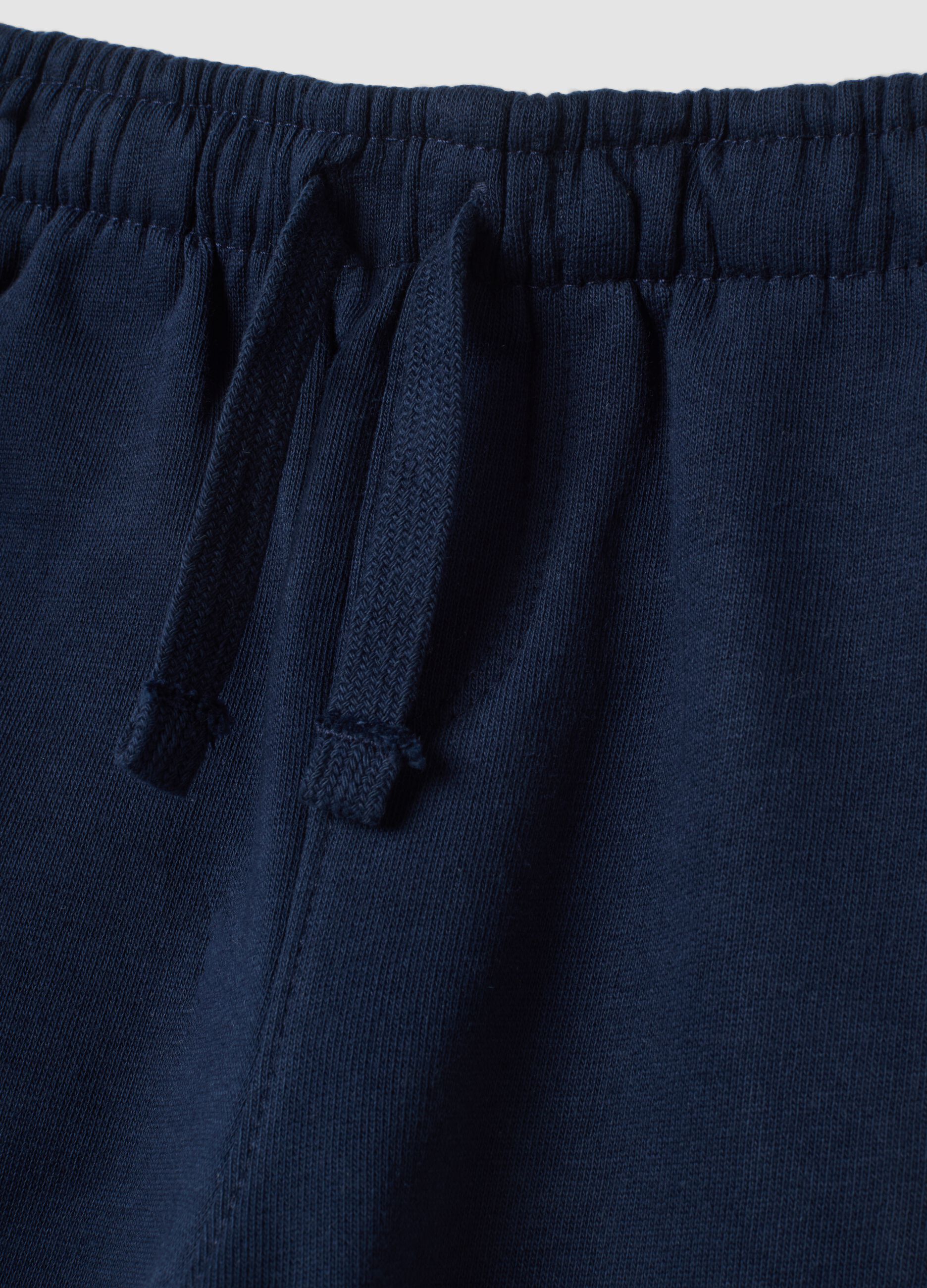 Blue pure cotton over-fit trousers with dinosaur print