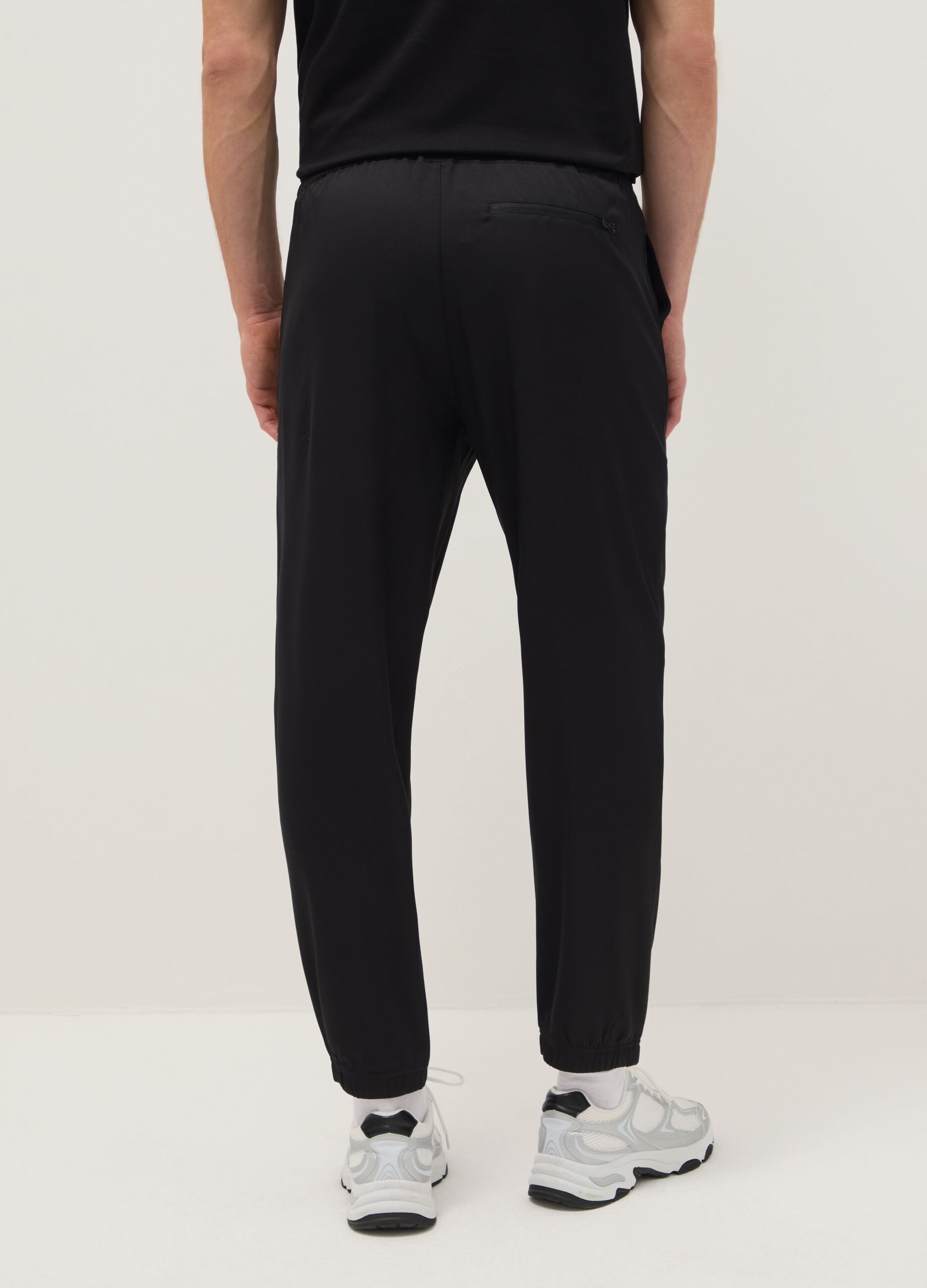 Black regular fit trousers with elasticated waist