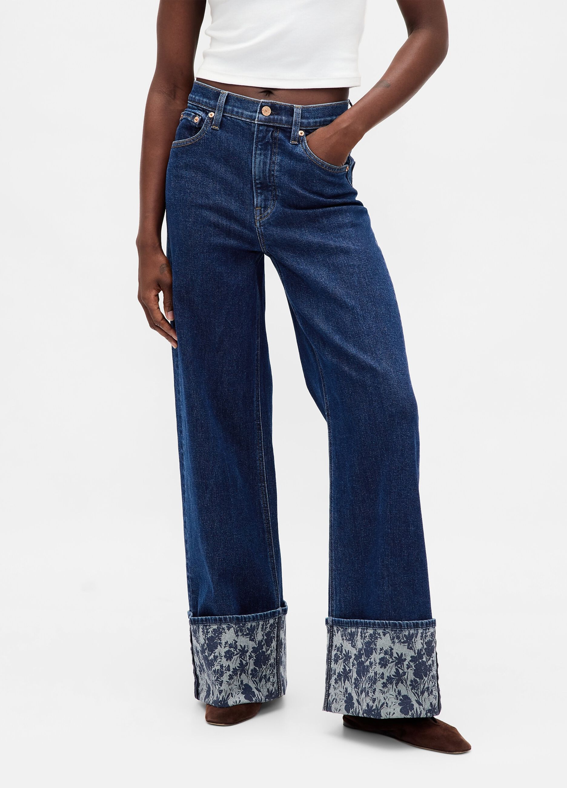 Wide denim trousers with floral turn-up