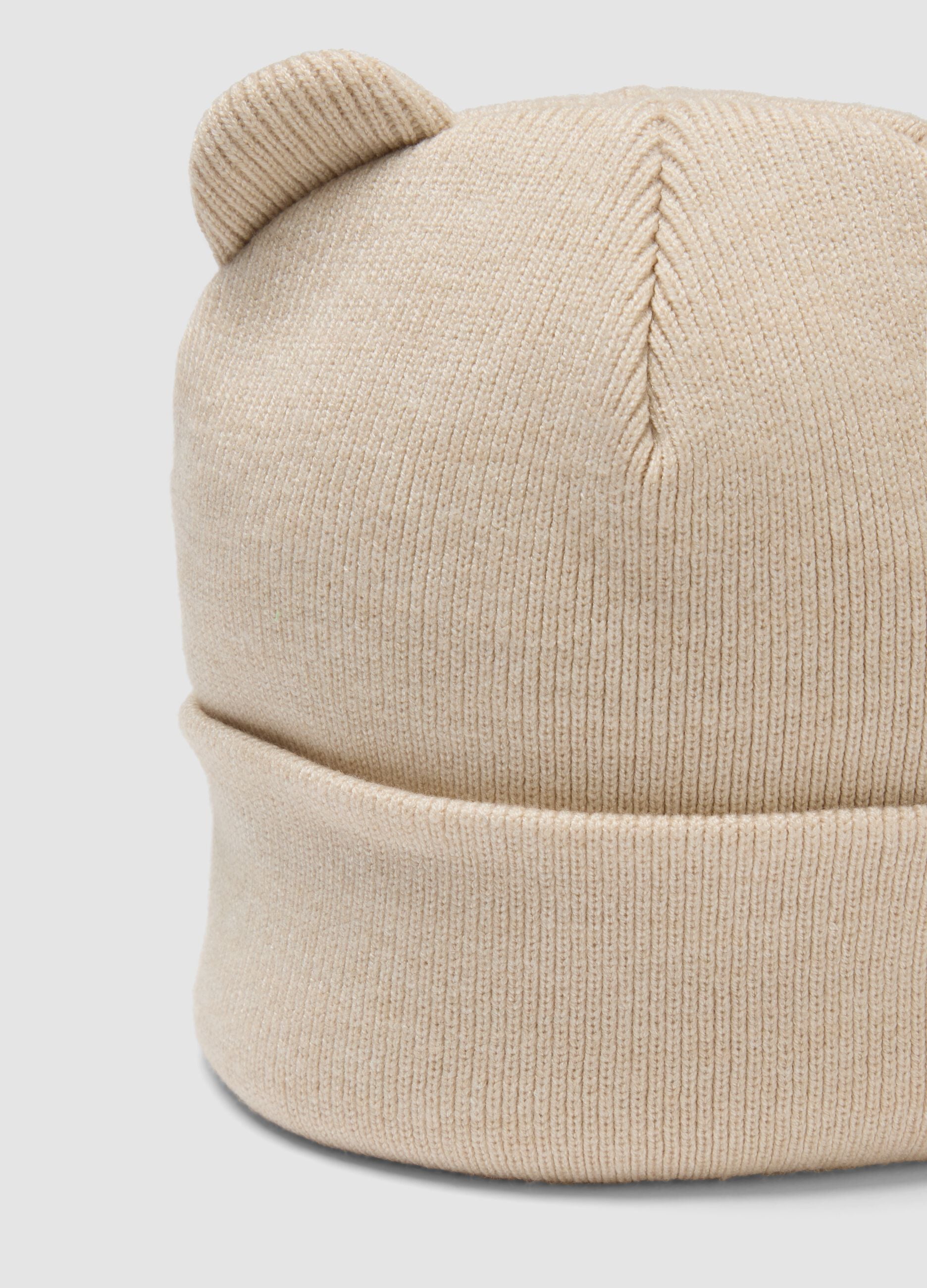 Beige knitted viscose-blend hat with ears