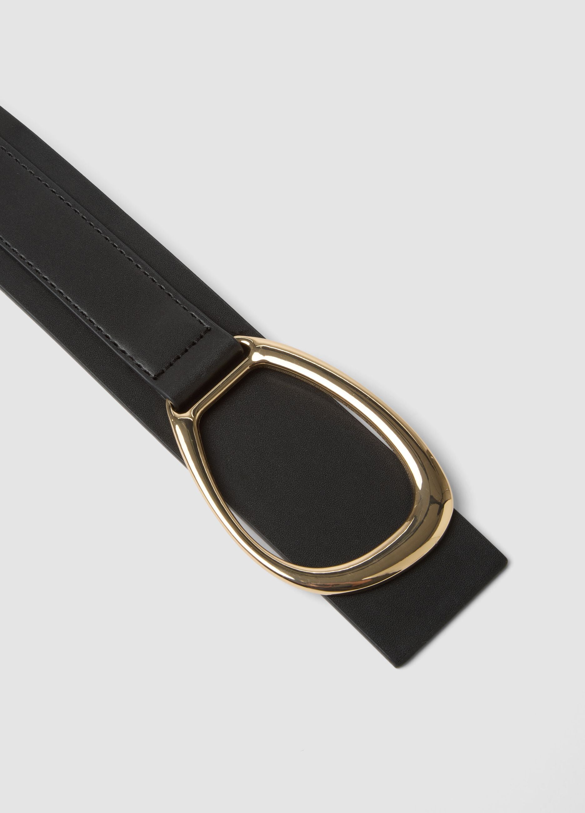 Black belt with gold oval buckle