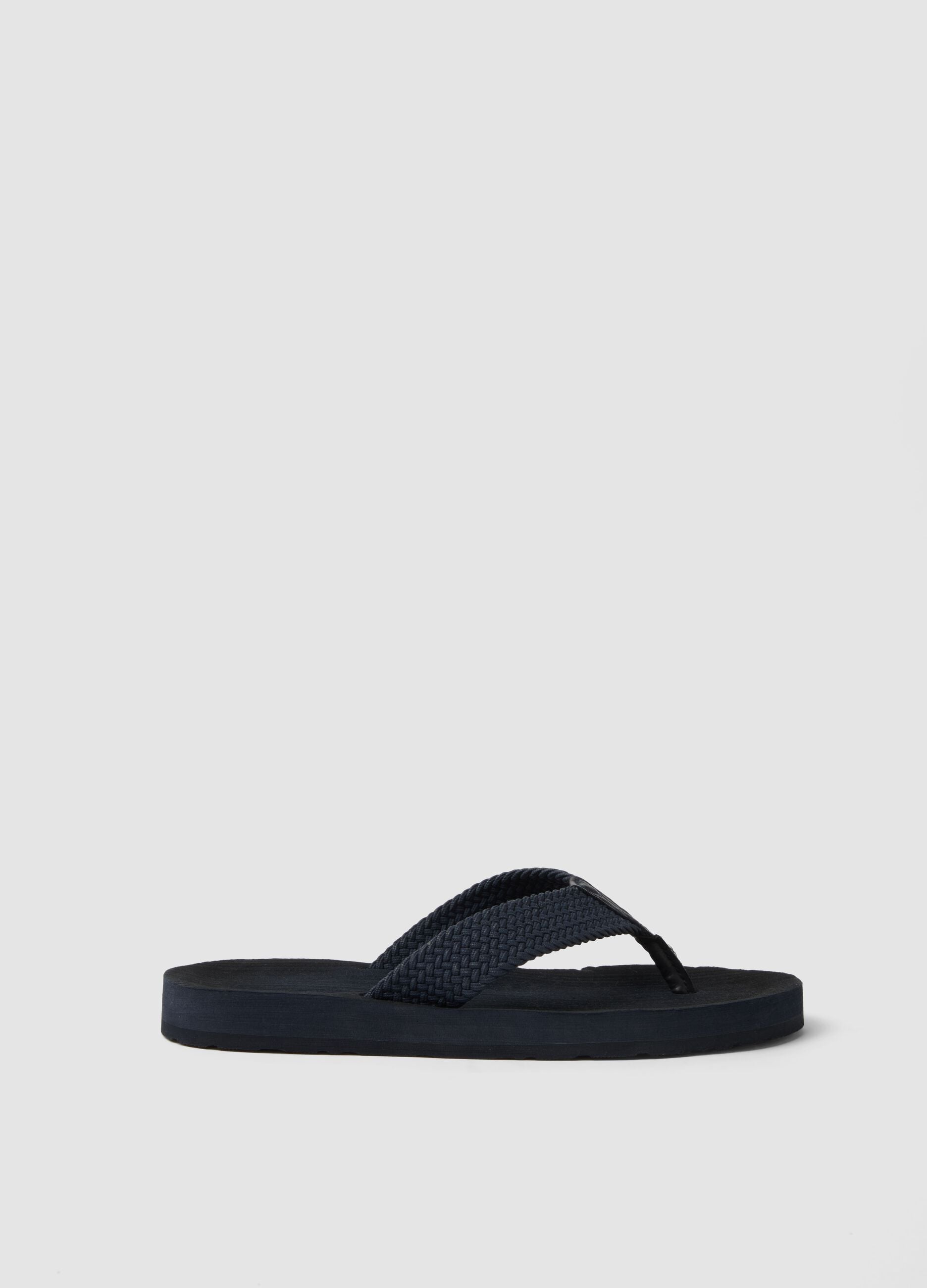 Blue flip-flops with woven strap