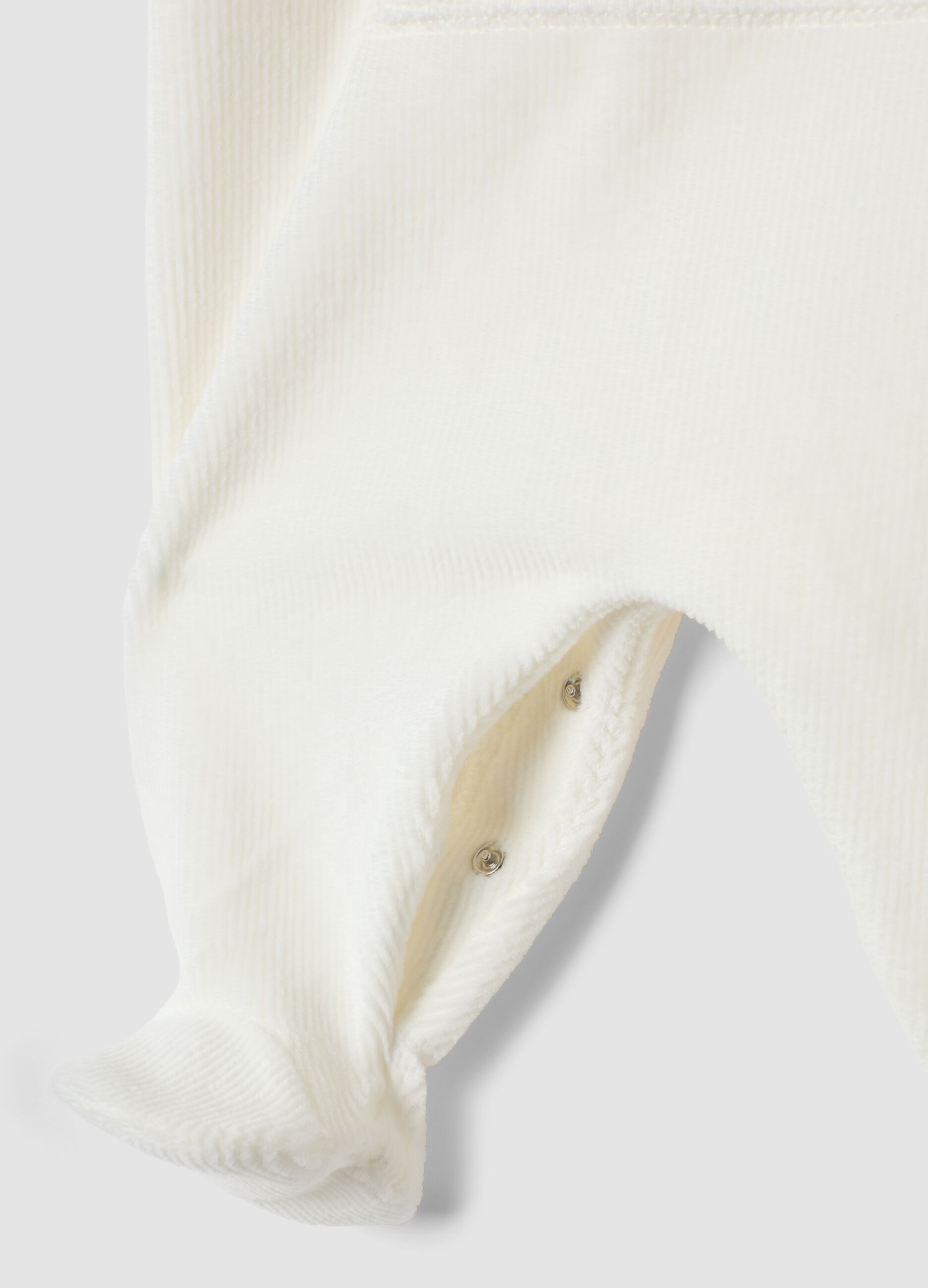 White organic stretch-cotton baby sleepsuit with built-in feet and Minnie print