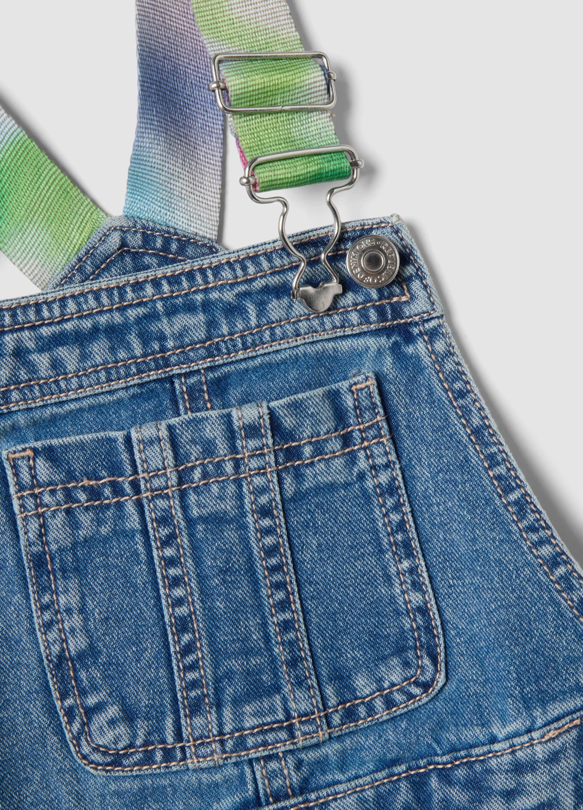 Girls&rsquo; blue denim dungarees in pure cotton with colourful braces