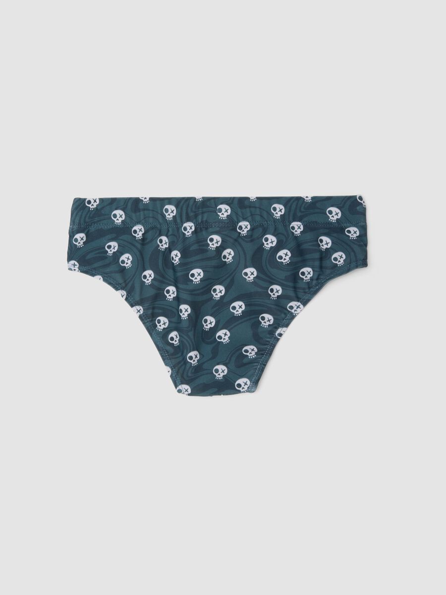 Slip mare blu in tessuto elasticizzato con stampa teschi_1