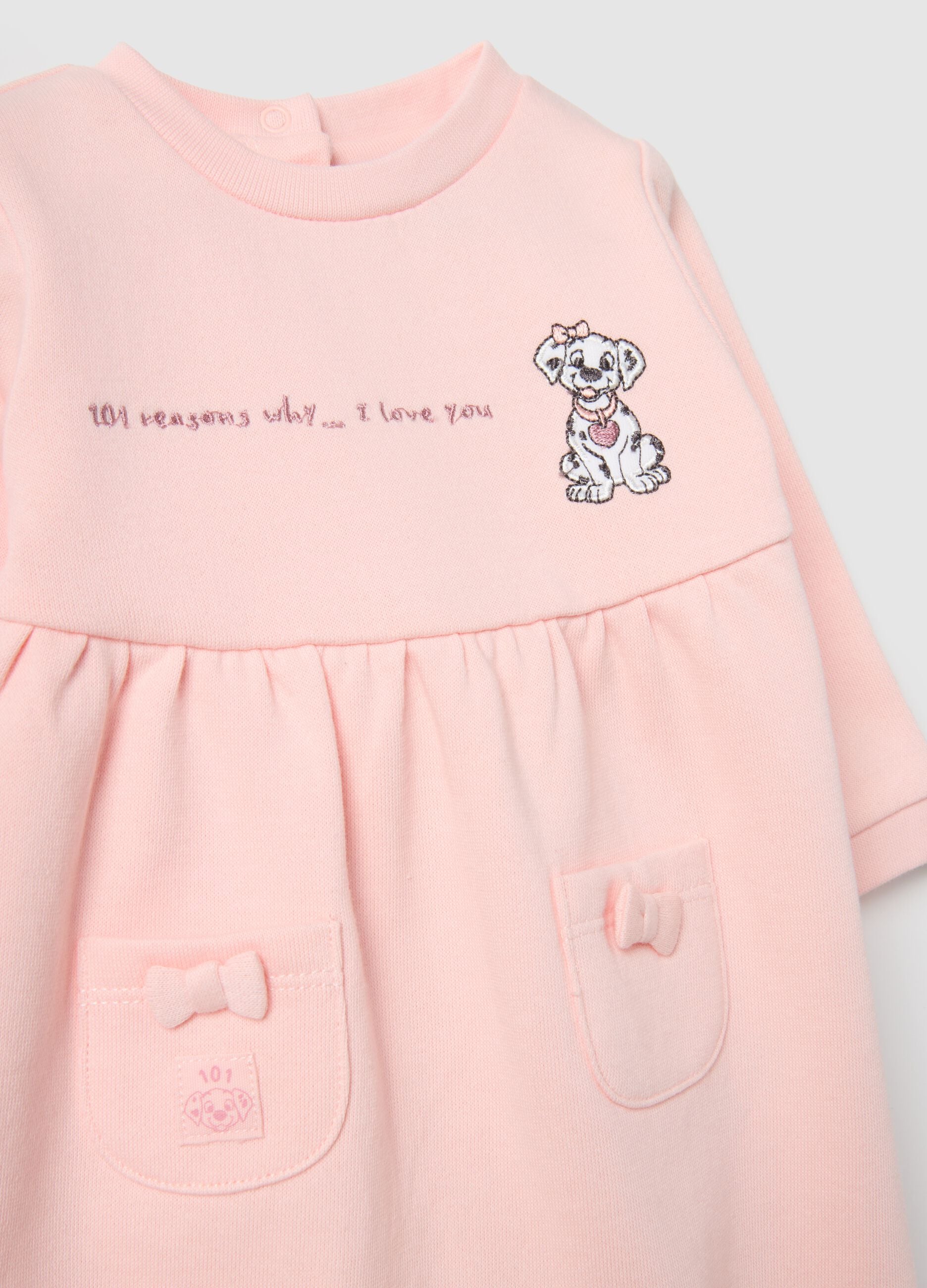 Baby girl's pink cotton sleepsuit with embroidered details
