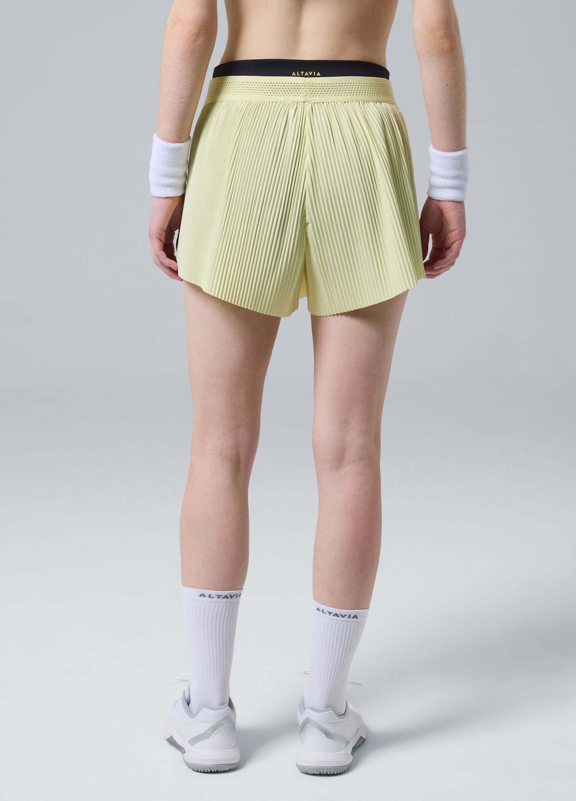 ALTAVIA COURT yellow pleated sports shorts in stretch fabric with removable inner short