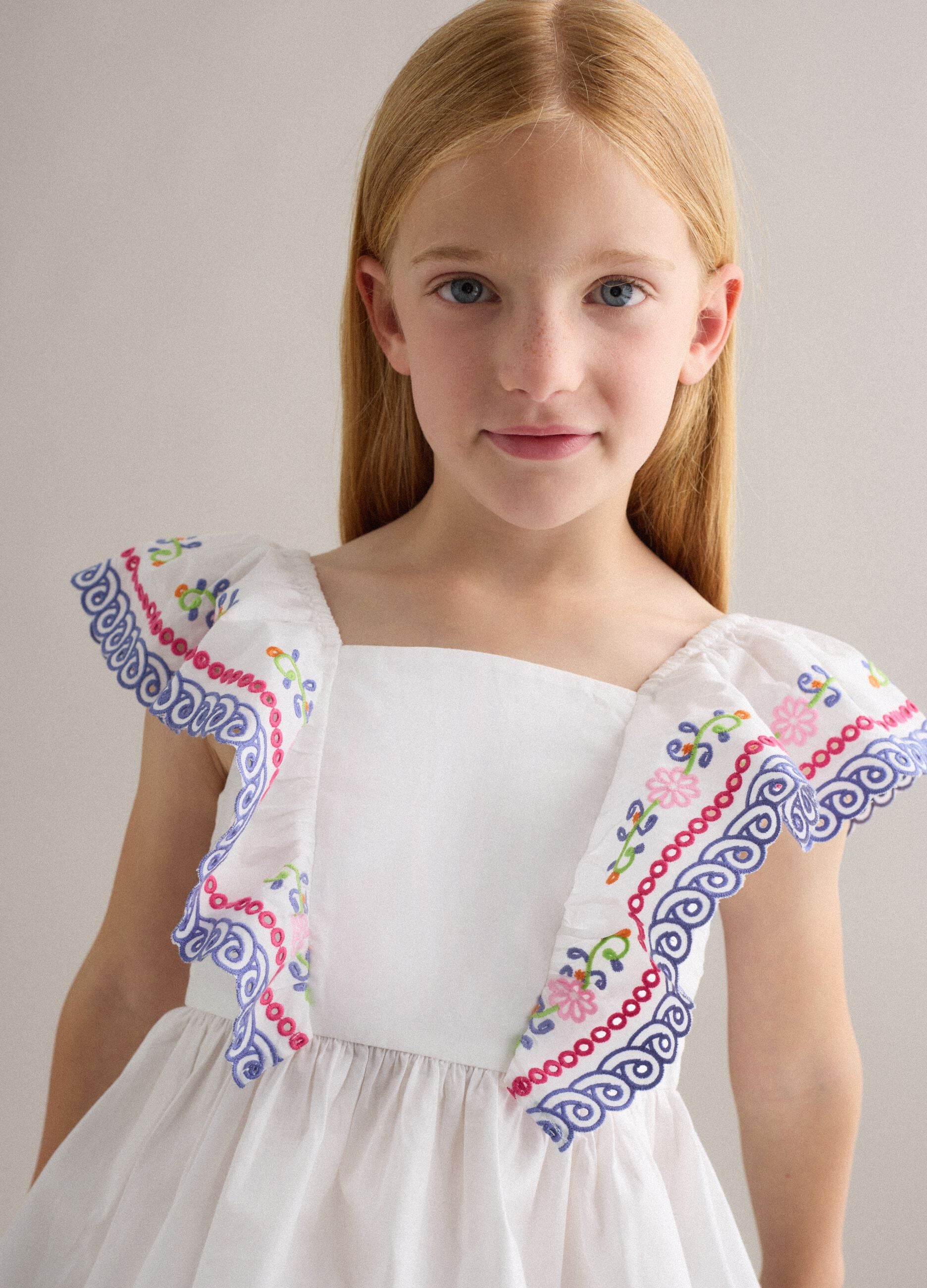 White pure cotton tank top with embroidered ruffle sleeves