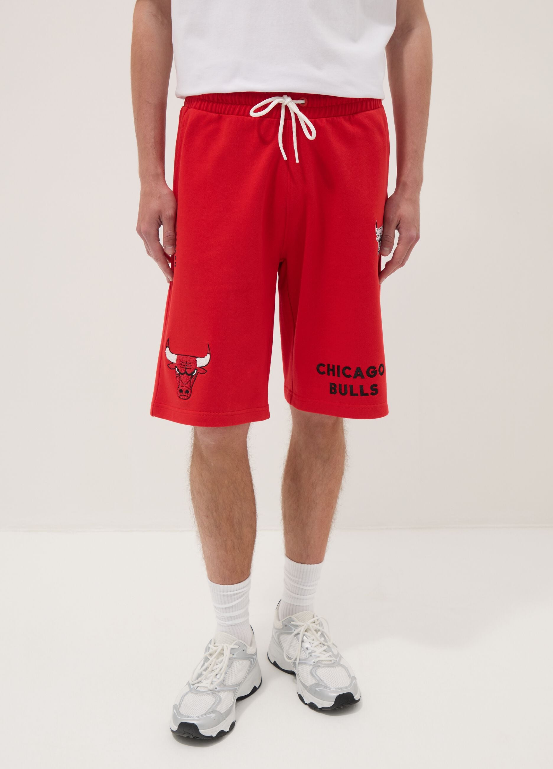 Red cotton-blend sports shorts with Chicago Bulls logo
