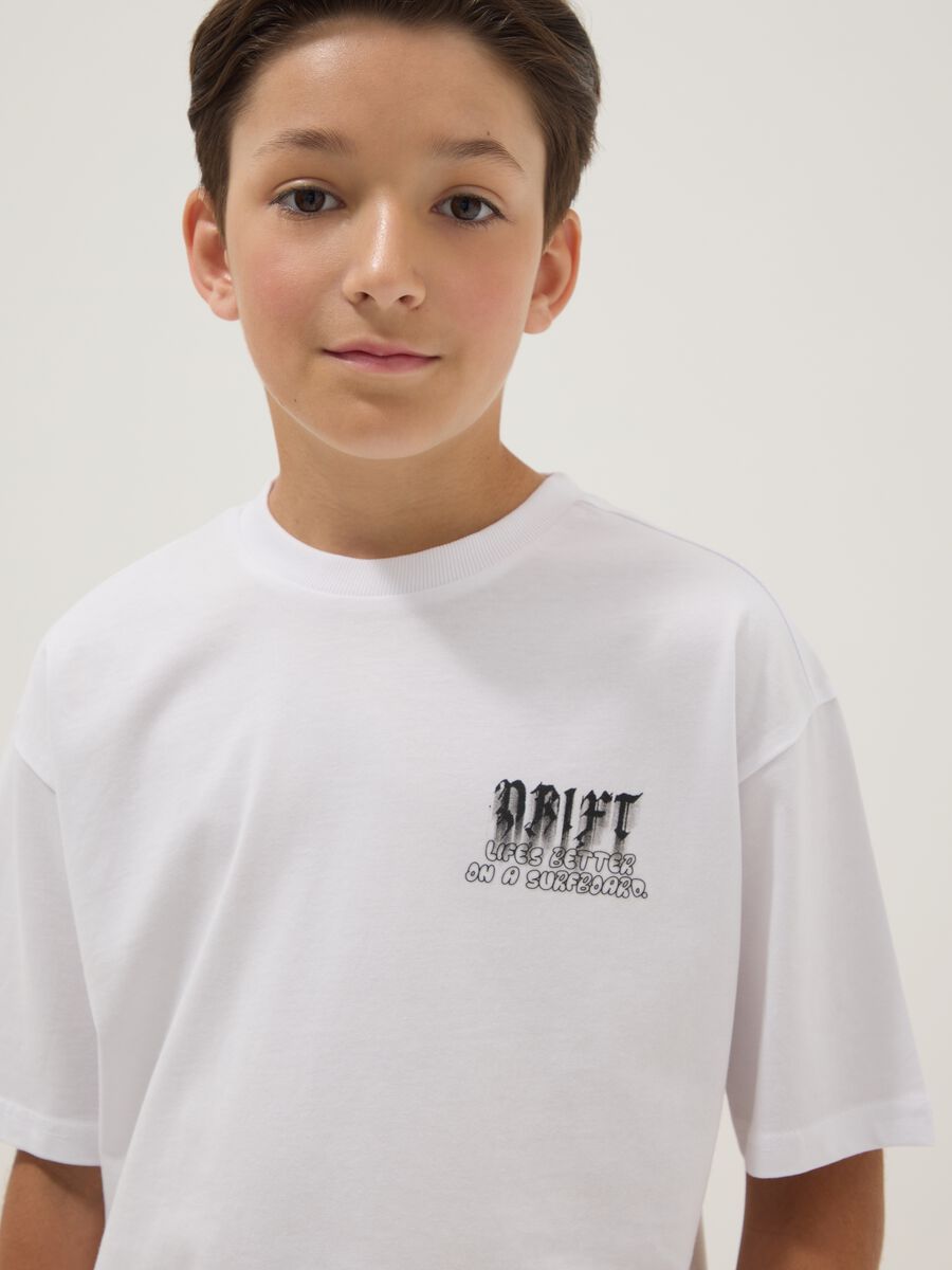 T-shirt bianca a maniche corte in puro cotone per ragazzo over fit_2