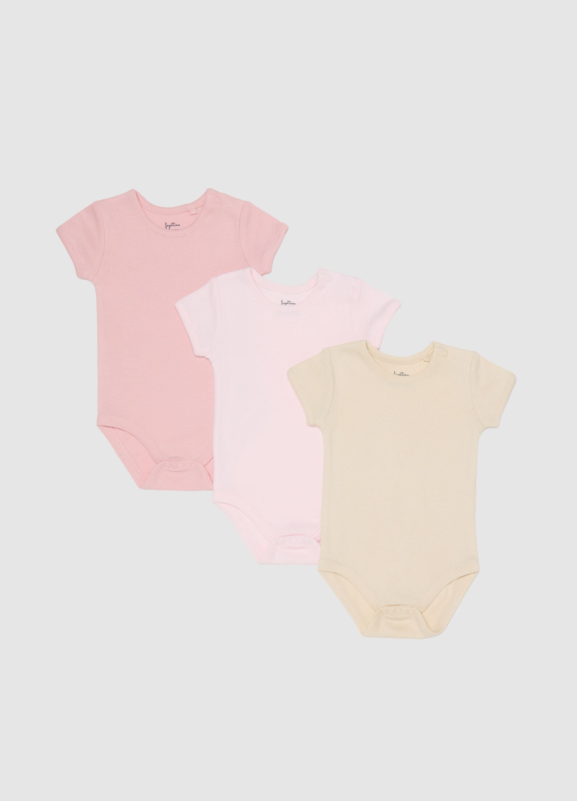 Multicoloured newborn cotton baby bodysuits in tripack