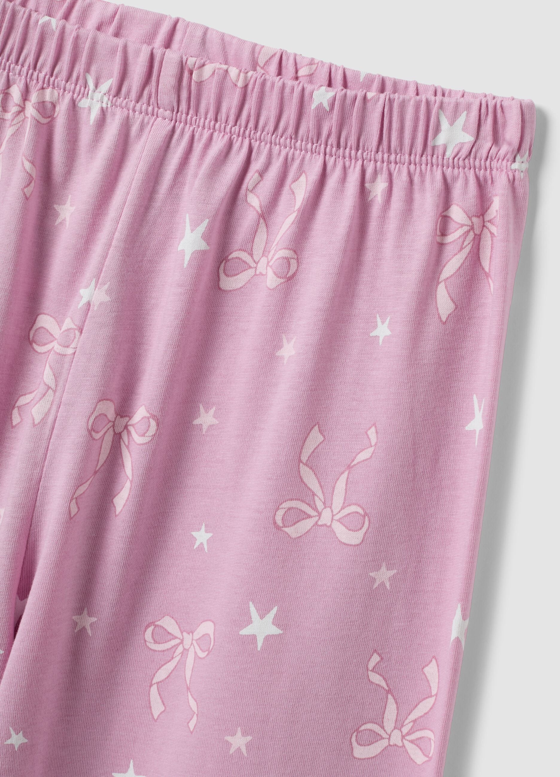 Pink organic cotton jersey pyjamas with bow print