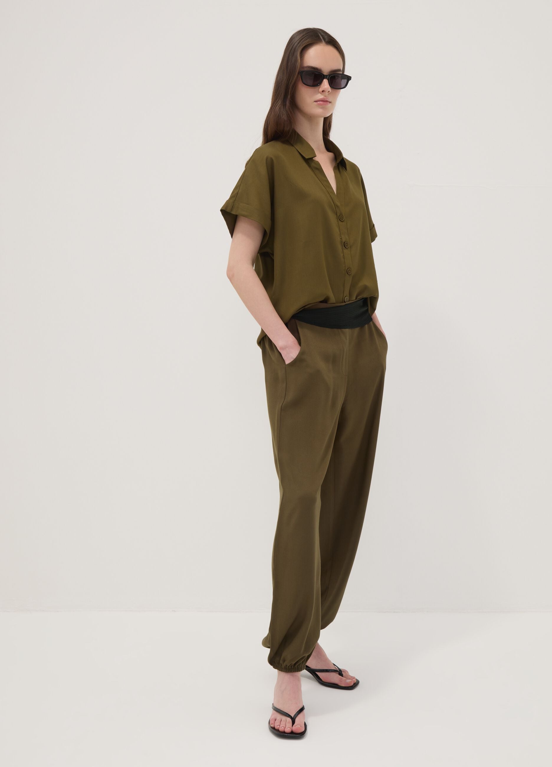 Green pure viscose trousers with elasticated cuffs, regular fit