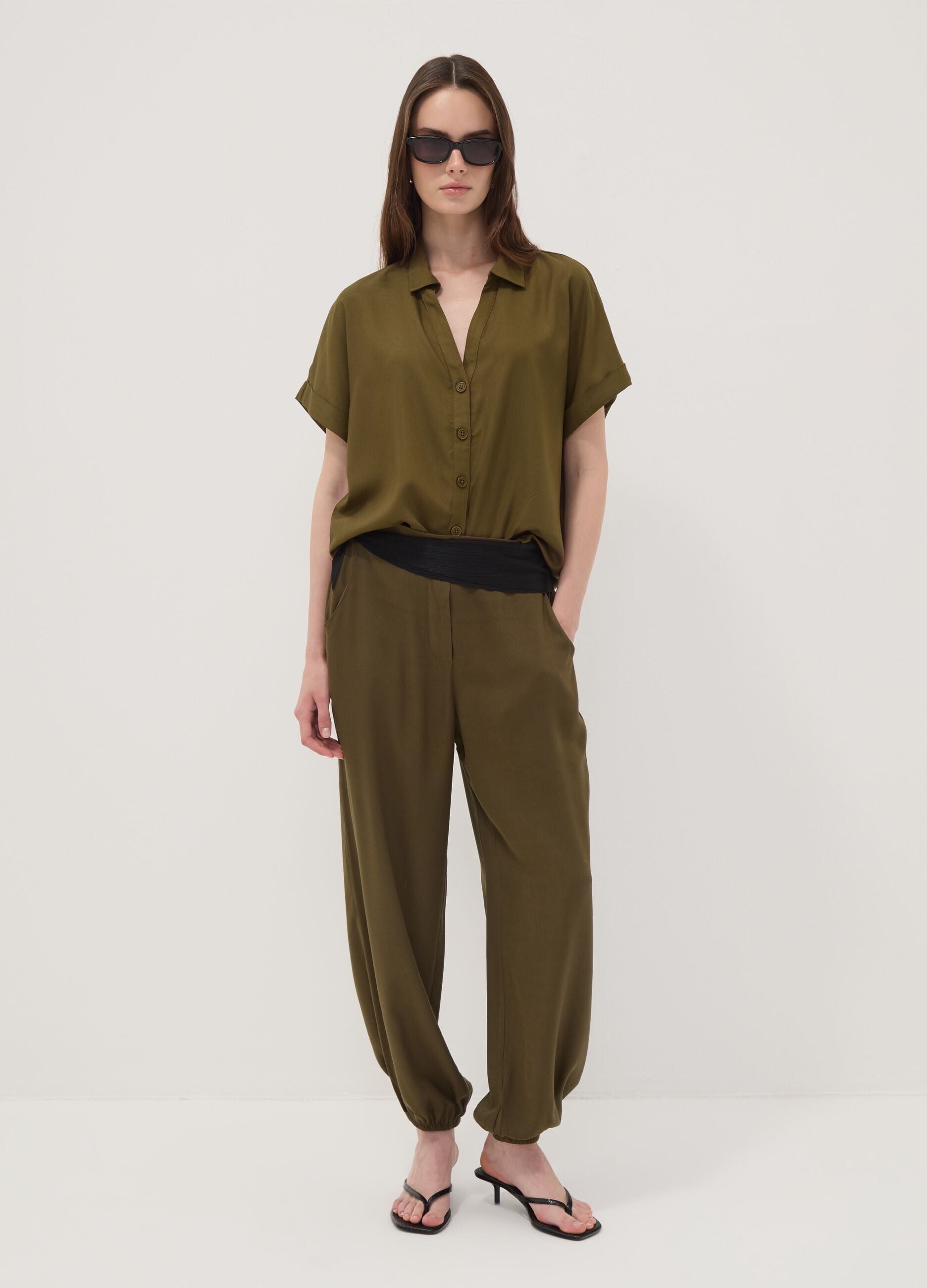 Green pure viscose trousers with elasticated cuffs, regular fit