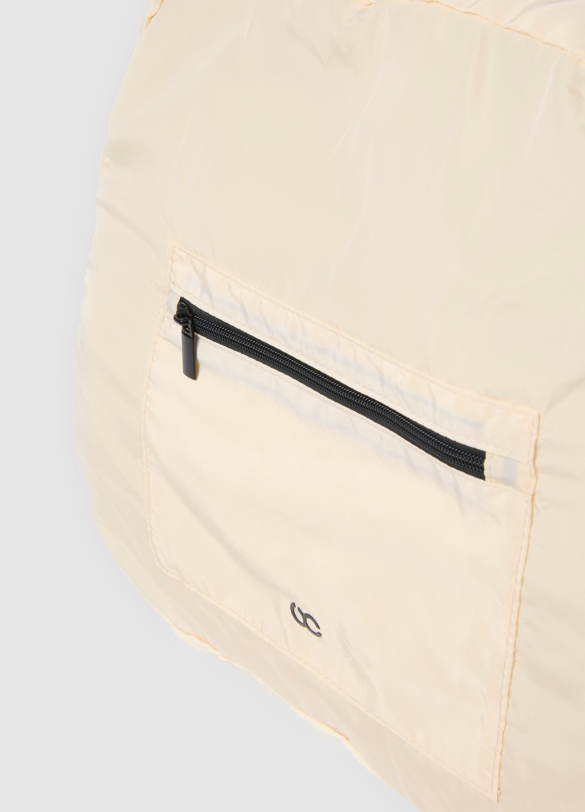 Beige shoulder bag with adjustable strap
