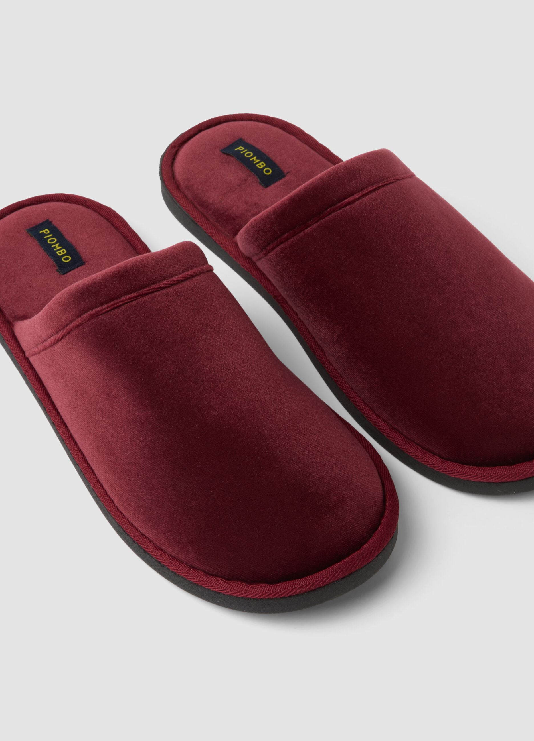 Red lined slippers for home wear