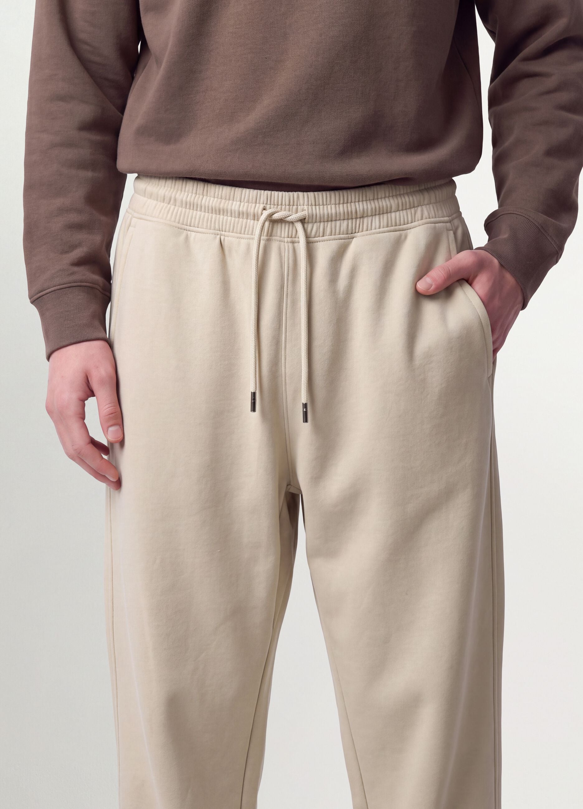 Jogger beige in misto cotone con fondo a polsino e coulisse