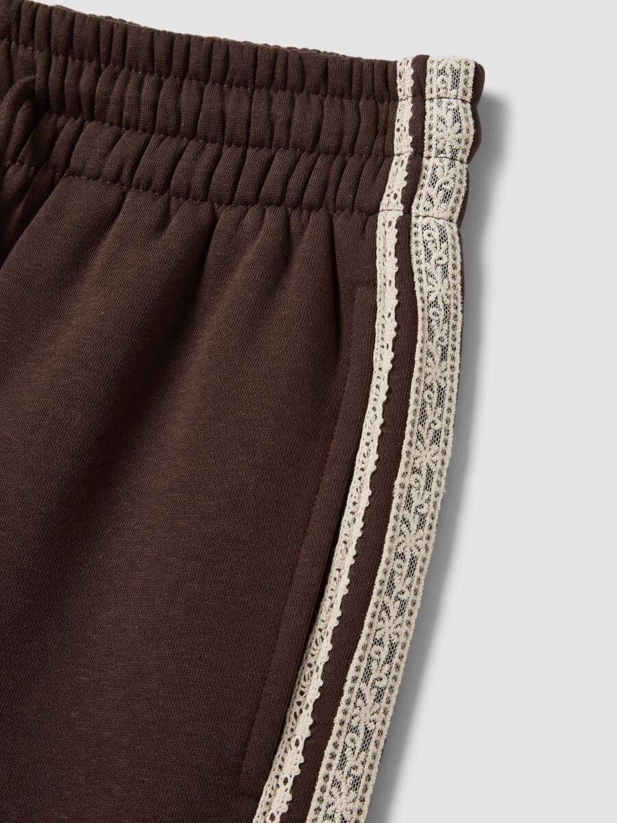 Brown cotton-blend wide-leg trousers with lace detailing_1